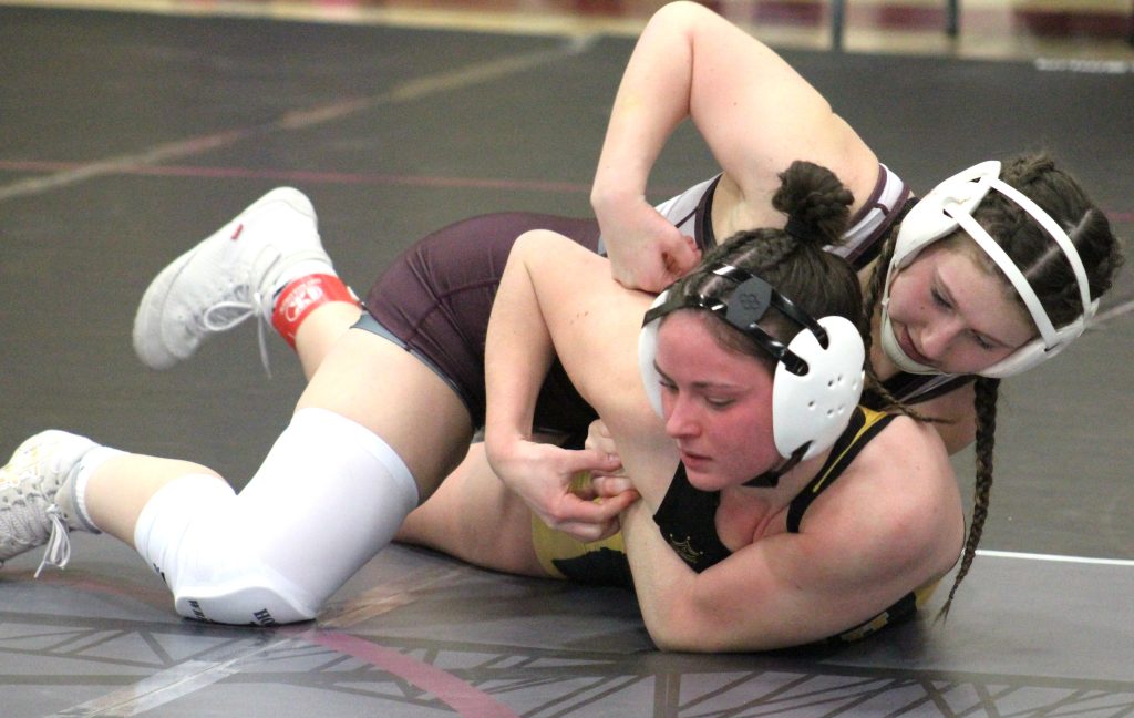Holmen senior Peyton Kratochvill has the upper hand in a match during a home invitational. -- TODD SOMMERFELDT PHOTO