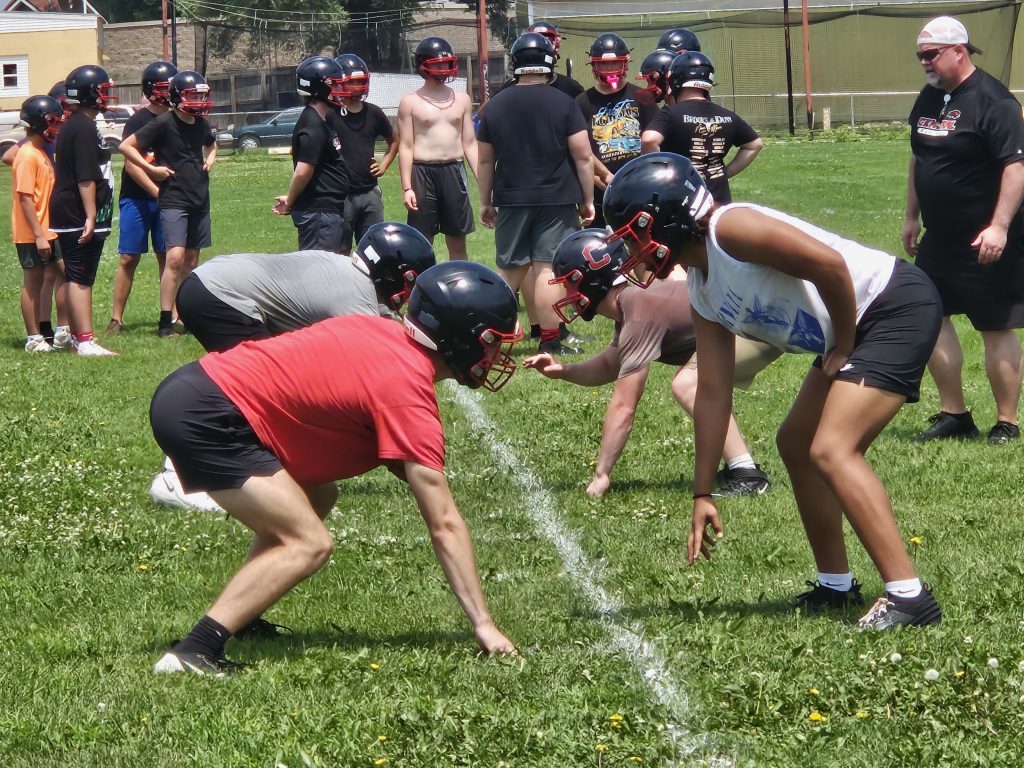 Central football players line up for a drill during Monday's one-hour practice. -- TODD SOMMERFELDT PHOTO