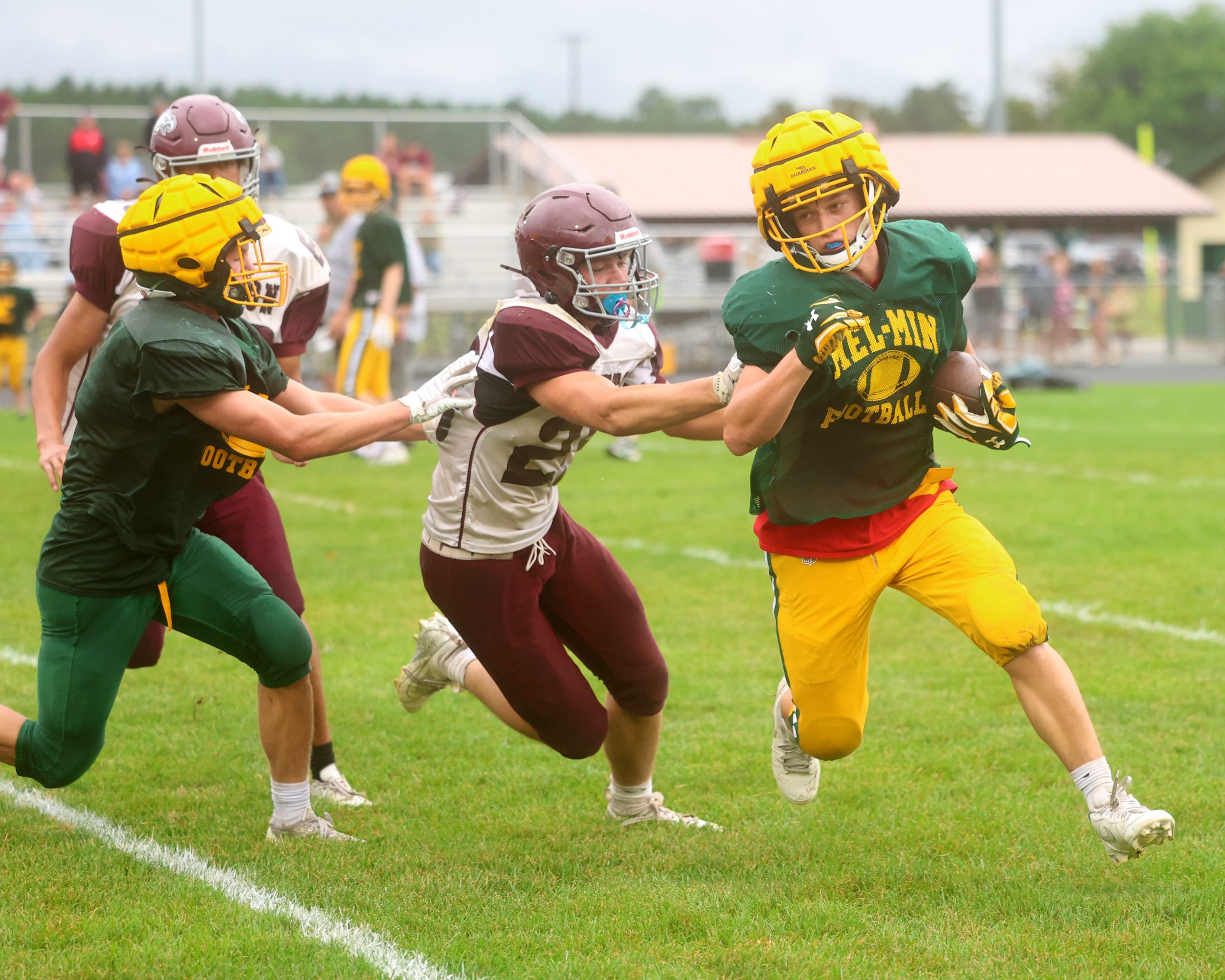 Melrose-Mindoro's Brewer Schlifer bounces towards the outside edge of the line after catching a pass in the flat during Saturday's scrimmage with Cashton. -- NATE BEIER PHOTO