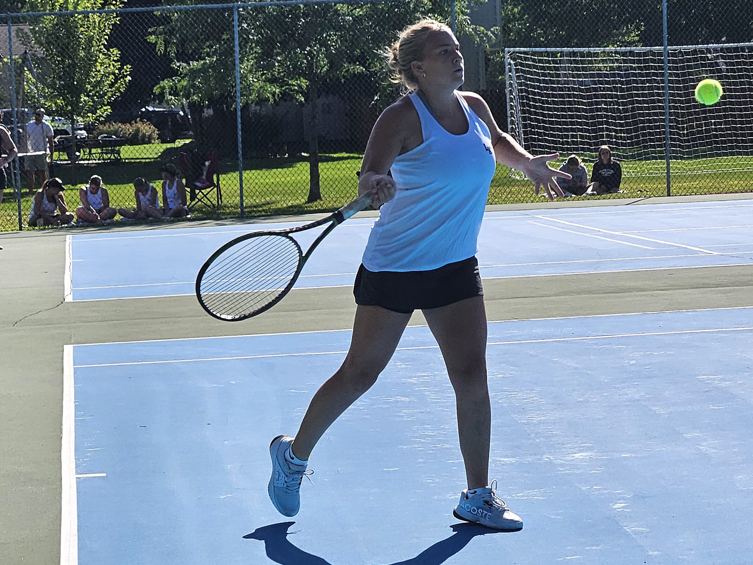 Onalaska Luther's Emma Kolb takes a swing during her No. 1 singles match against Holmen. -- TODD SOMMERFELDT PHOTO