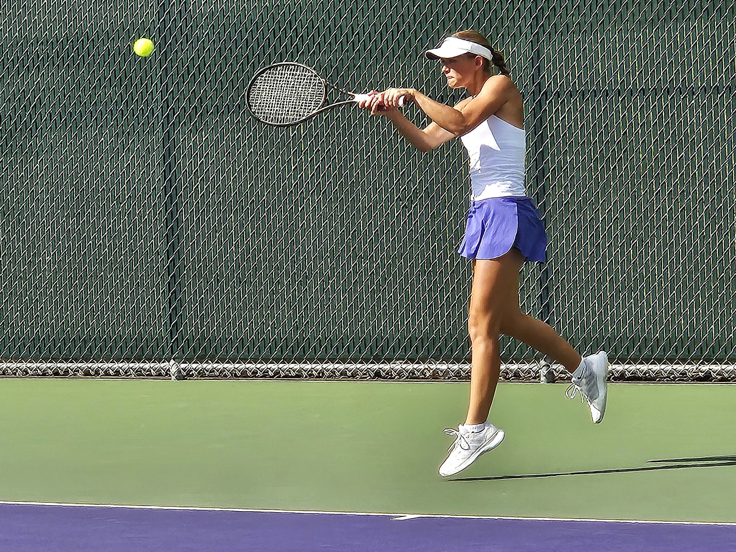 Onalaska's Mara Klein plays a No. 1 singles tennis match against Reedsburg. -- TODD SOMMERFELDT PHOTO