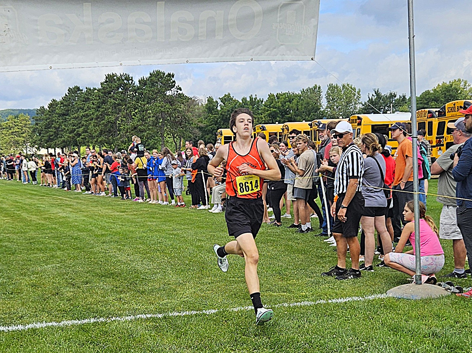 West Salem sophomore Evan Berra crosses the finish line first in the Gale Johnson Invitational at Maple Grove Venues. -- TODD SOMMERFELDT PHOTO