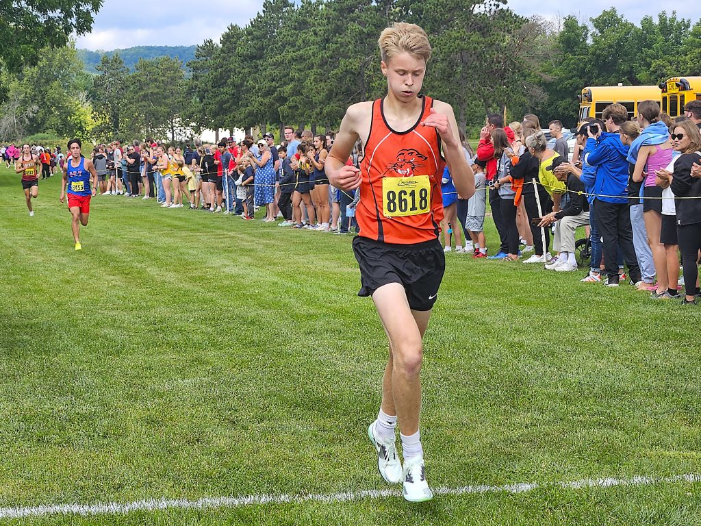 West Salem junior Andrew Lorenz crosses the finish line at the Gale Johnson Invitational. -- TODD SOMMERFELDT PHOTO