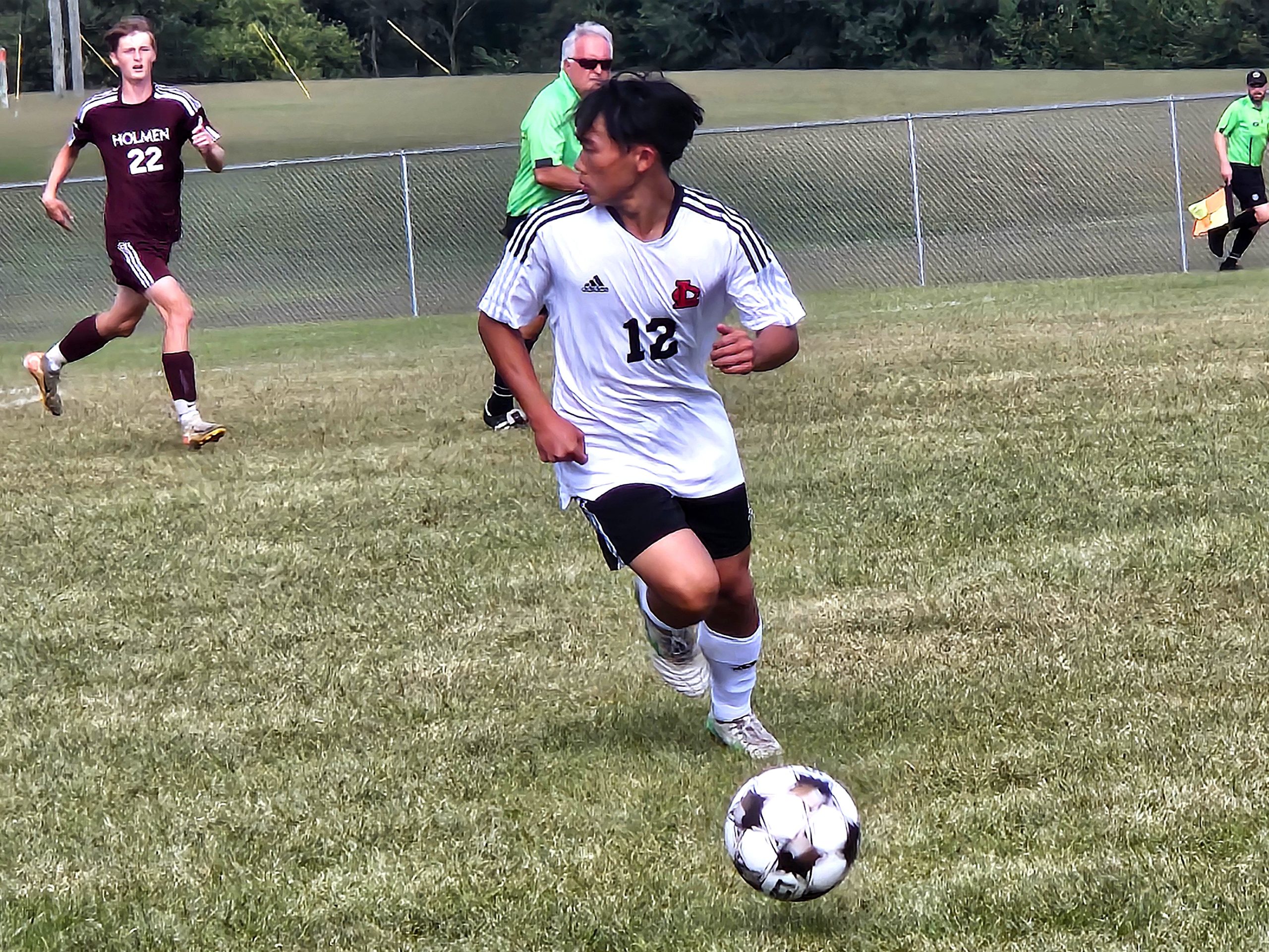 Central sophomore Leighvy Lee chases down the ball during an MVC soccer game at Holmen. -- TODD SOMMERFELDT PHOTO