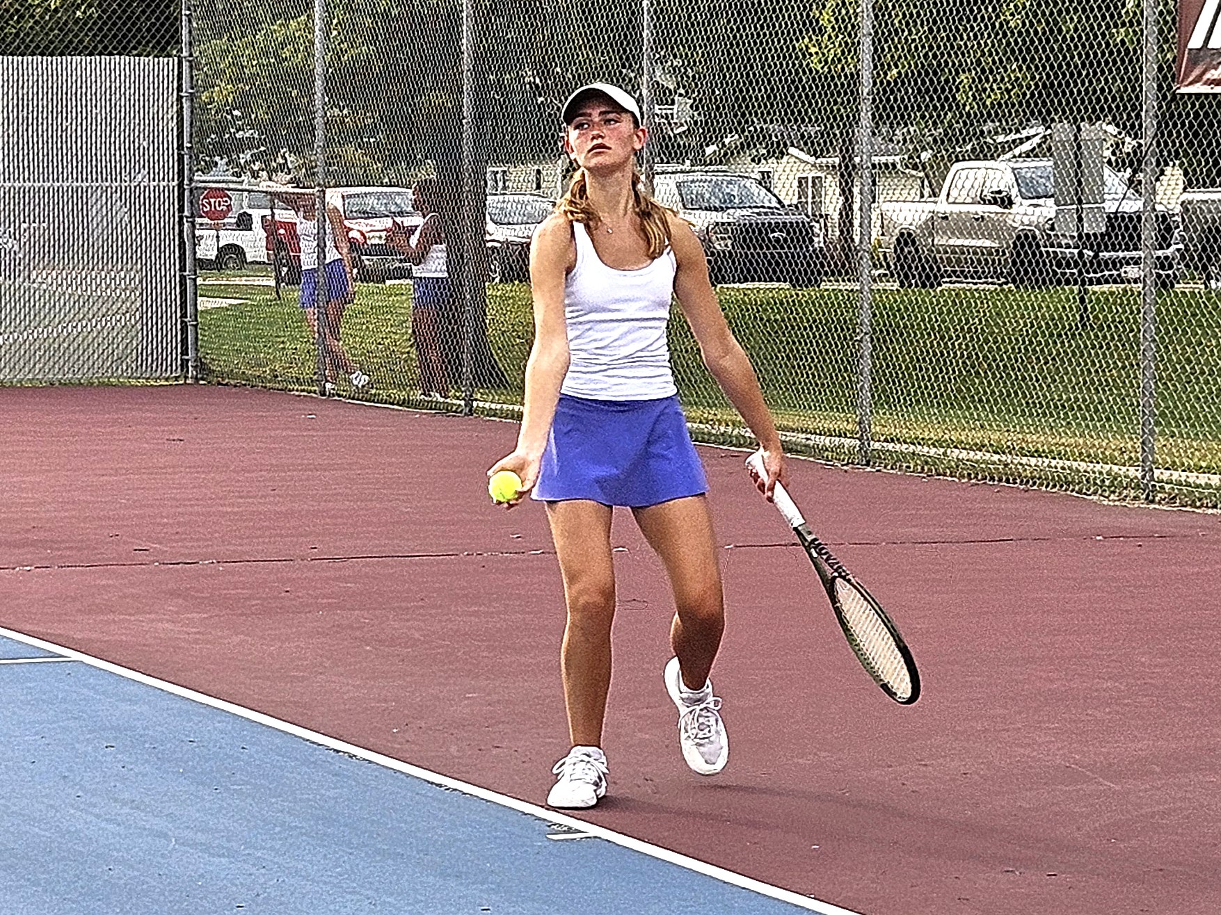 Onalaska's Mara Klein prepares to serve in her NO. 1 singles match against Holmen on Thursday. -- TODD SOMMERFELDT PHOTO
