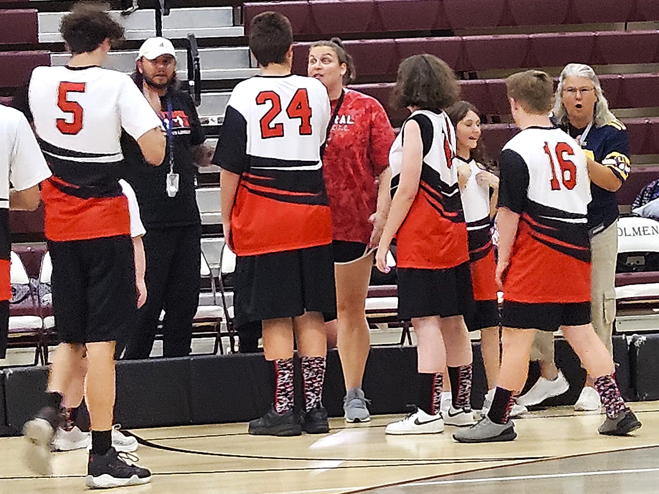 The Central ASL soccer team talks stretegy during a game against Holmen. -- TODD SOMMERFELDT PHOTO