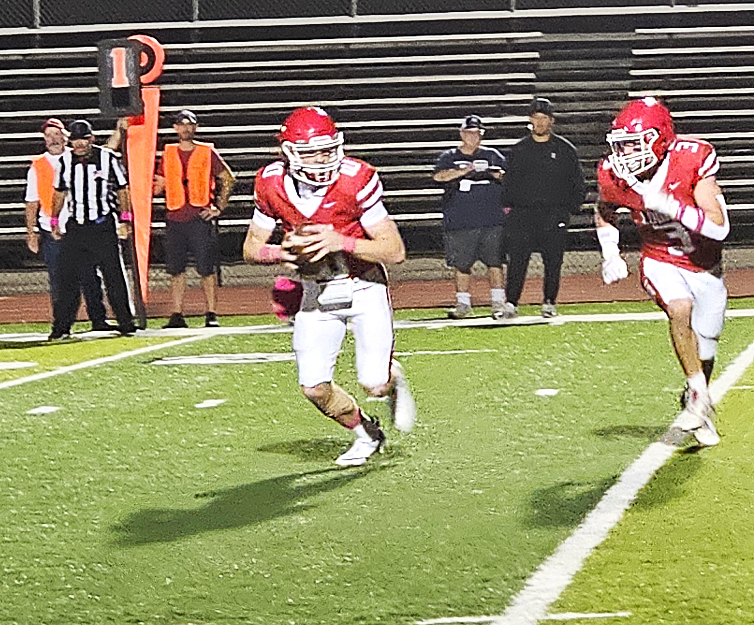 Logan quarterback Tommy Check look so pitch the football to Jackson Bosch during Friday's 42-36 overtime win over Reedsburg at Swanson Field. -- TODD SOMMERFELDT PHOTO