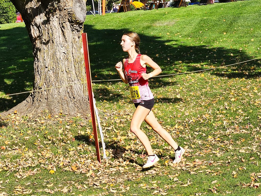 Central sophomore Charlotte Yard runs in the Dick Mitchell Invitational at Maple Grove Venues on Saturday. -- TODD SOMMERFELDT PHOTO