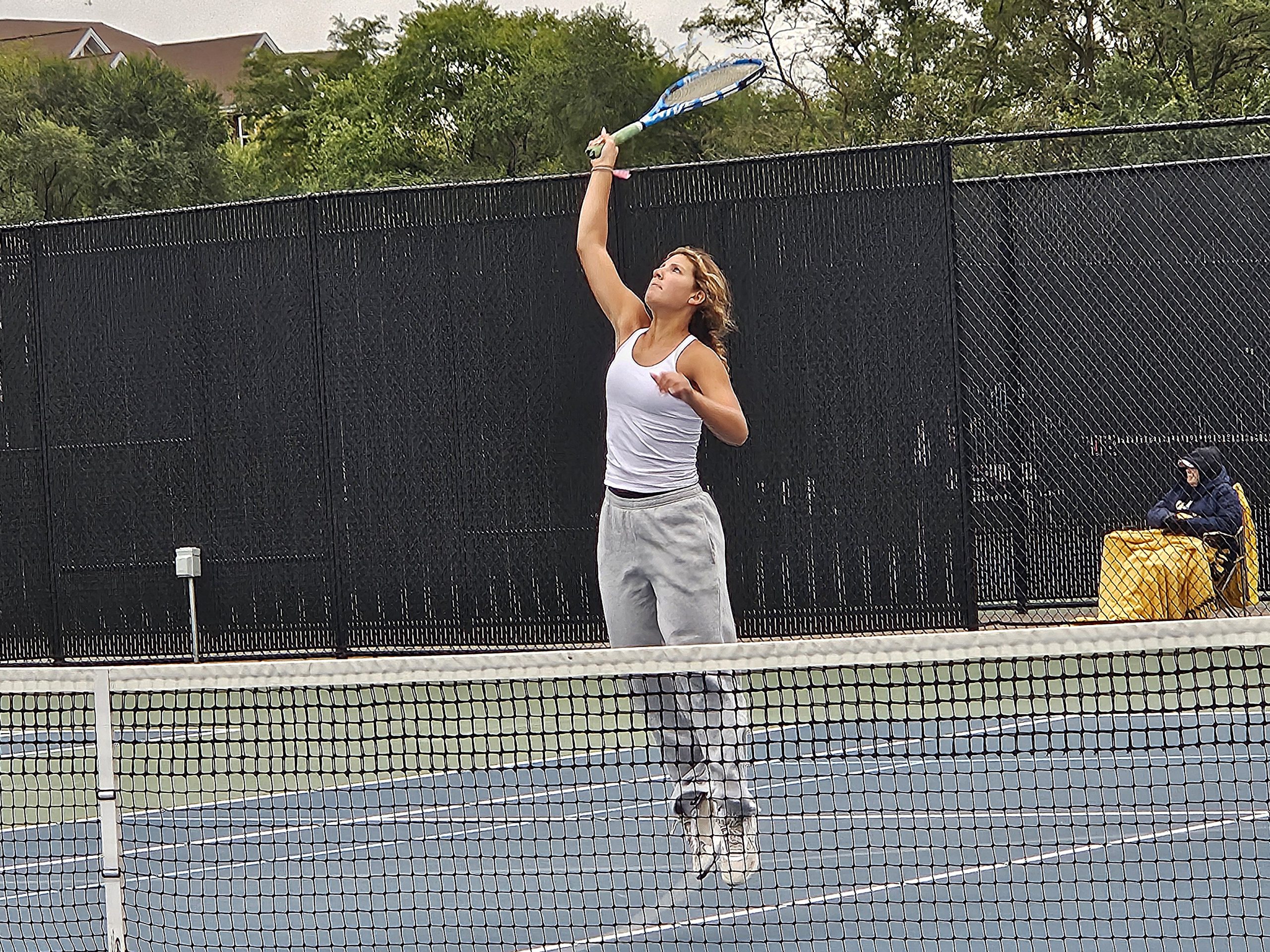 Aquinas senior Elly Binsfield makes a play at the net during a No. 3 doubles match at the WIAA Division 1 Onalaska Subsectional on Monday. -- TODD SOMMERFELDT PHOTO