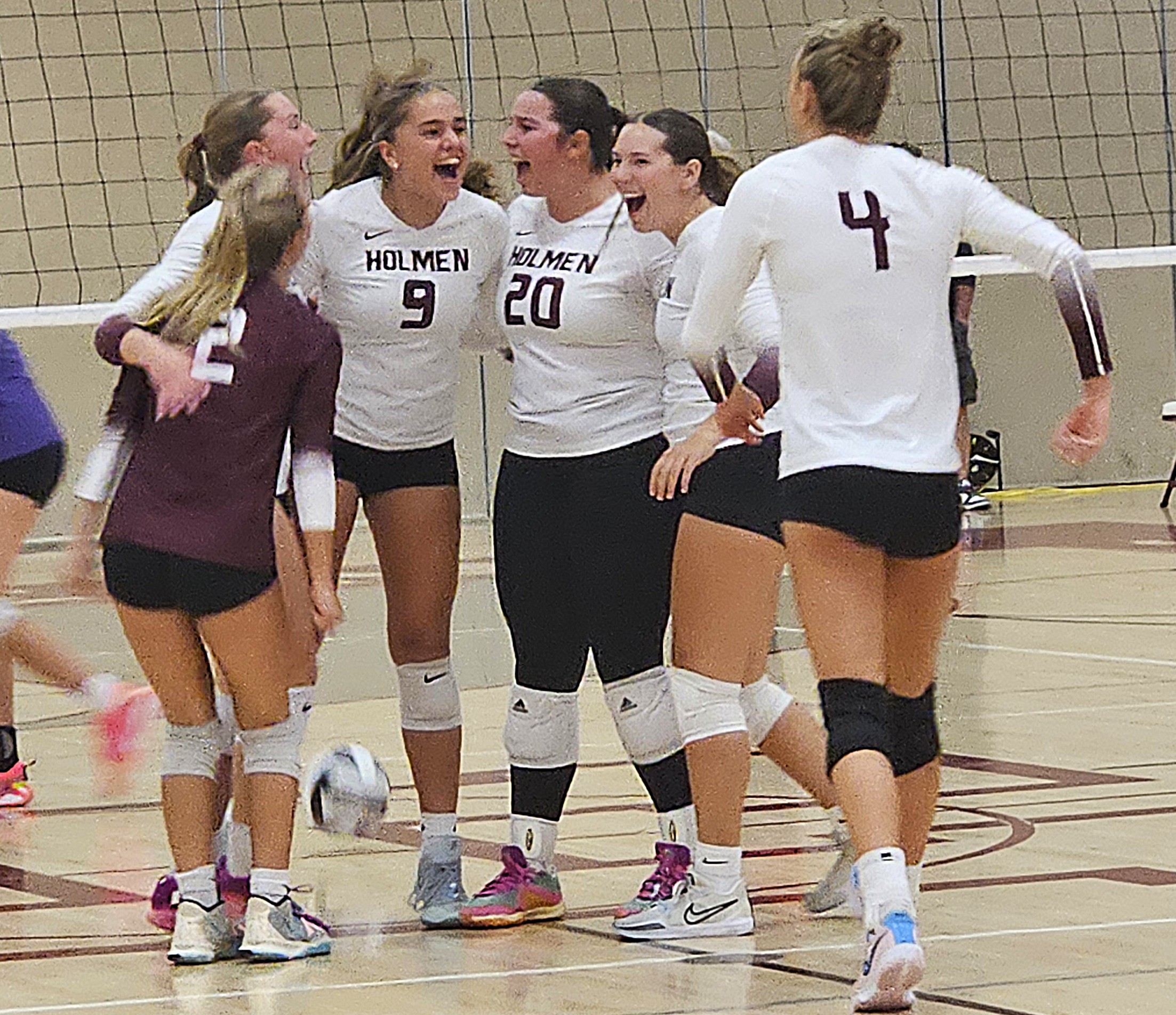 The Holmen volleyball team celebrates a point during Thursday's MVC matchup against Onalaska. -- TODD SOMMERFELDT PHOTO