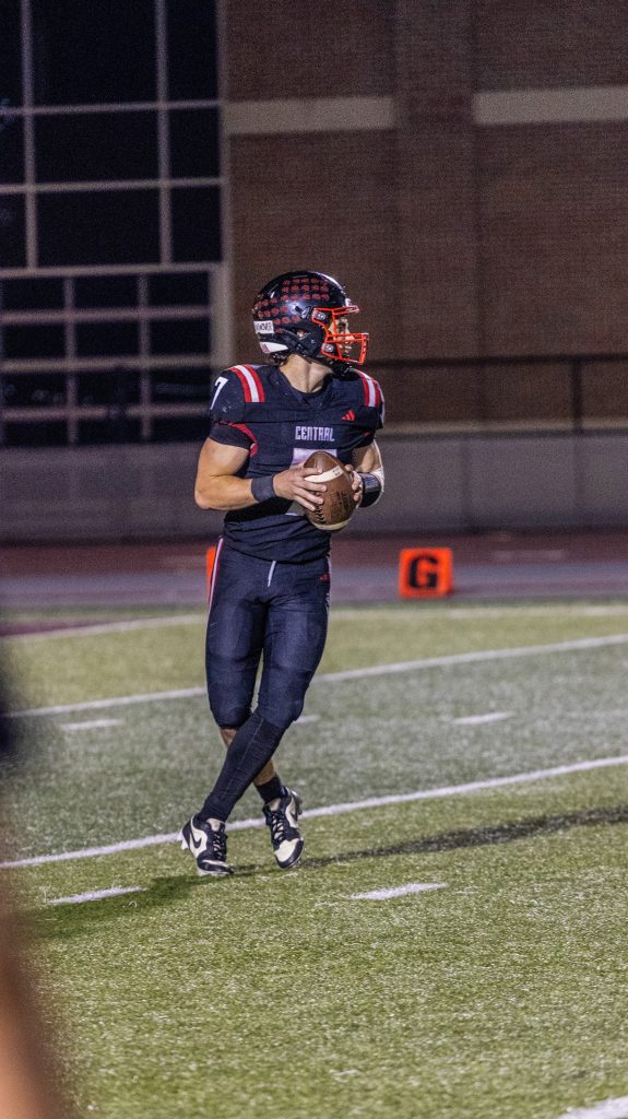 Central quarterback Christian Rudrud looks for an open receiver during an MVC football game against Onalaska. -- KAYLEE ZIELKE PHOTO