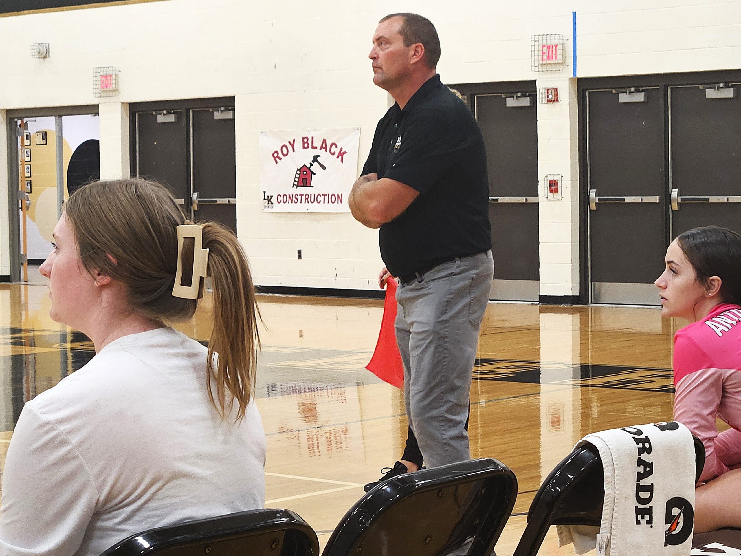 Onalaska Luther volleyball coach Dan Larson watches the action as his Knights play Westby. -- TODD SOMMERFELDT PHOTO