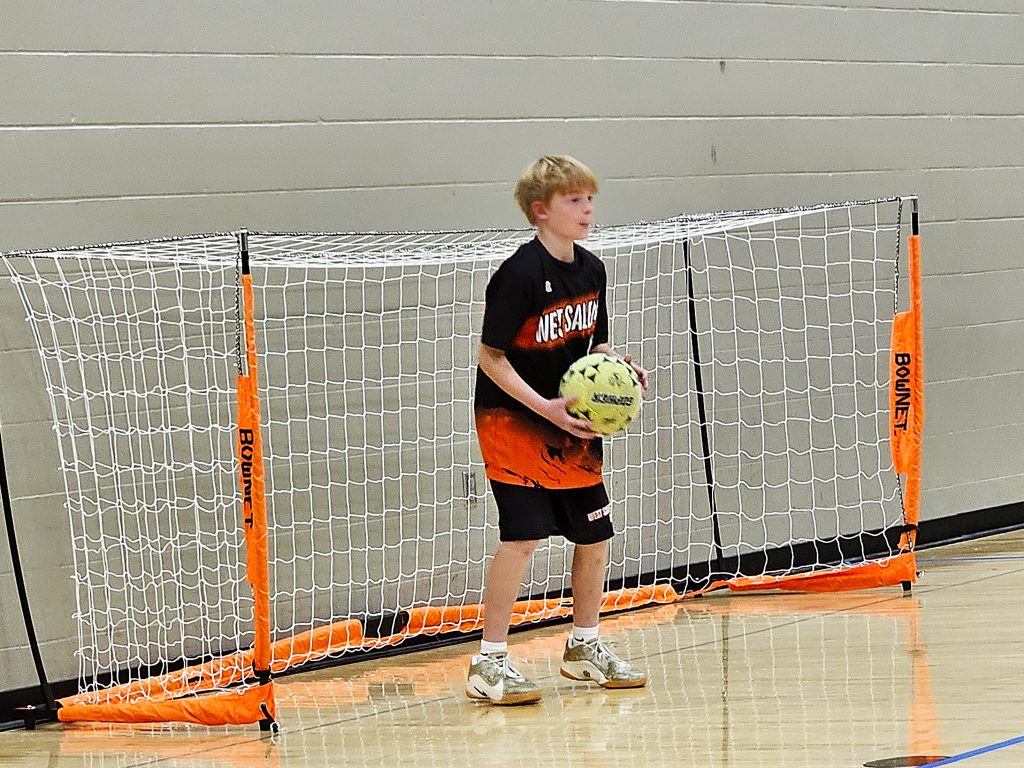 West Salem/Bangor's Cam Arndt looks to put the ball back in play after a save vs. Logan in an ASL soccer game. -- TODD SOMMERFELDT PHOTO