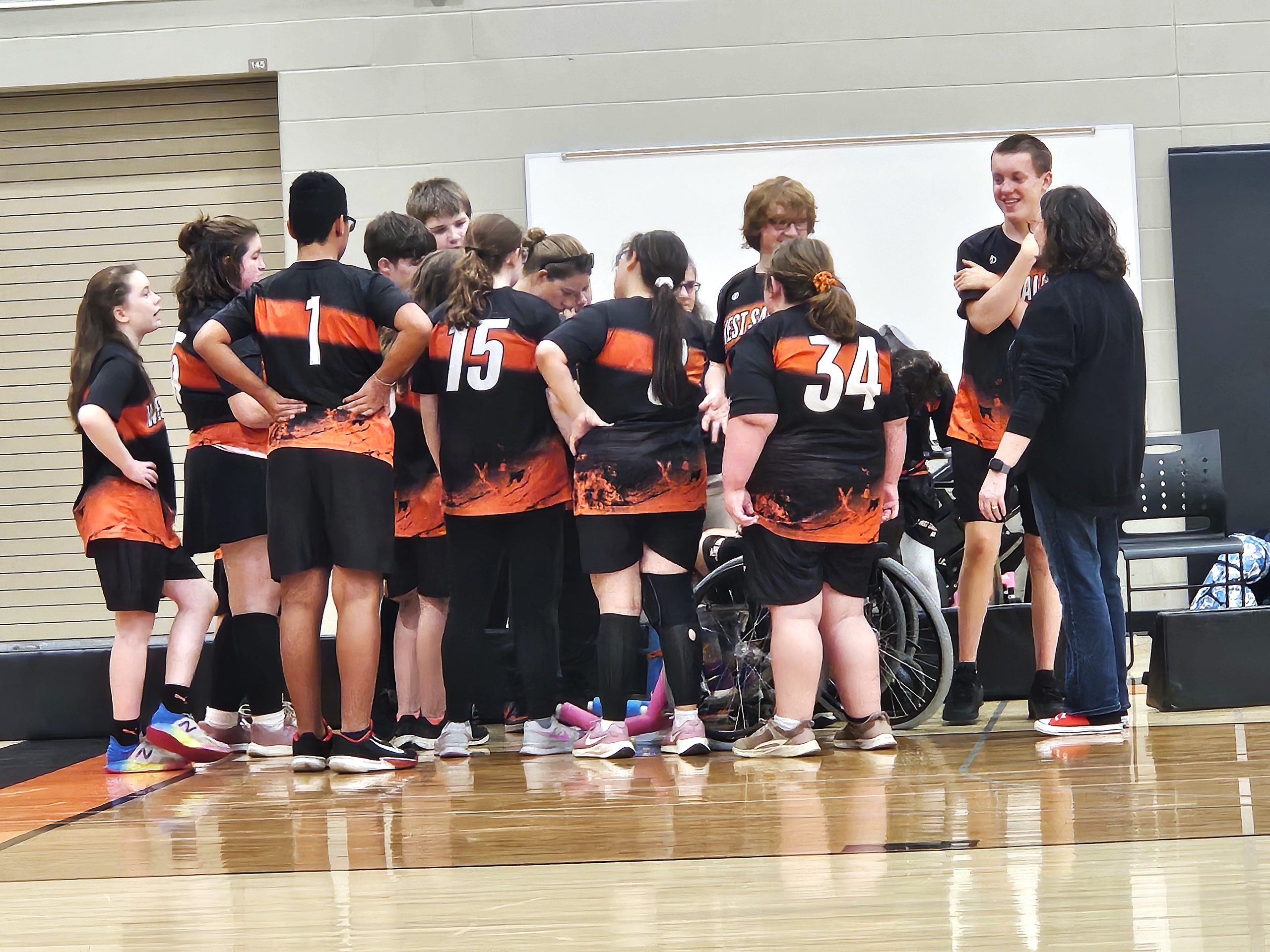 The West Salem/Bangor ASL soccer team huddles during its game against Logan. -- TODD SOMMERFELDT PHOTO