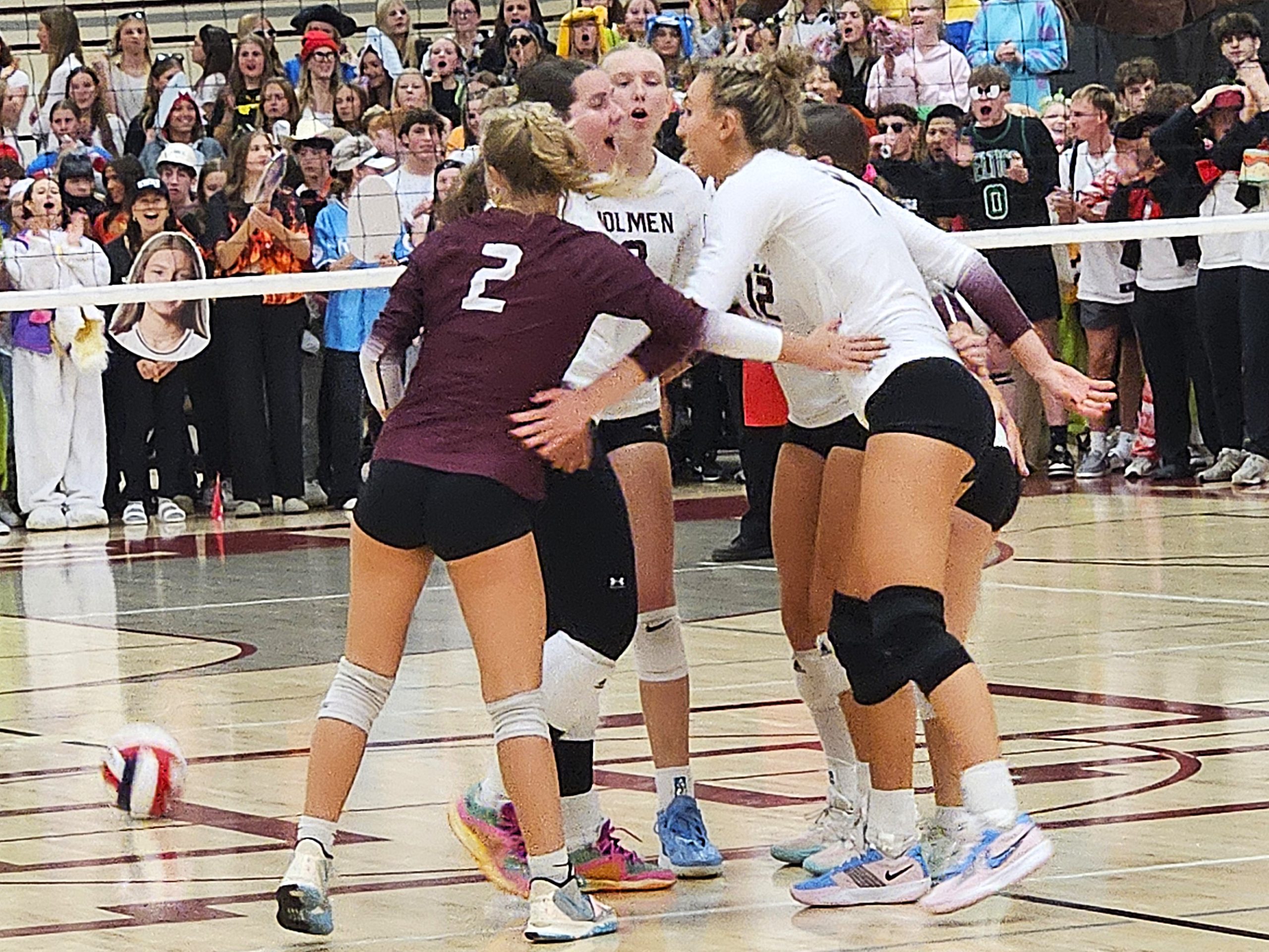 The Holmen volleyball team celebrates a point during its WIAA Division 1 sectional semifinal win over DeForest on Thursday, -- TODD SOMMERFELDT PHOTO