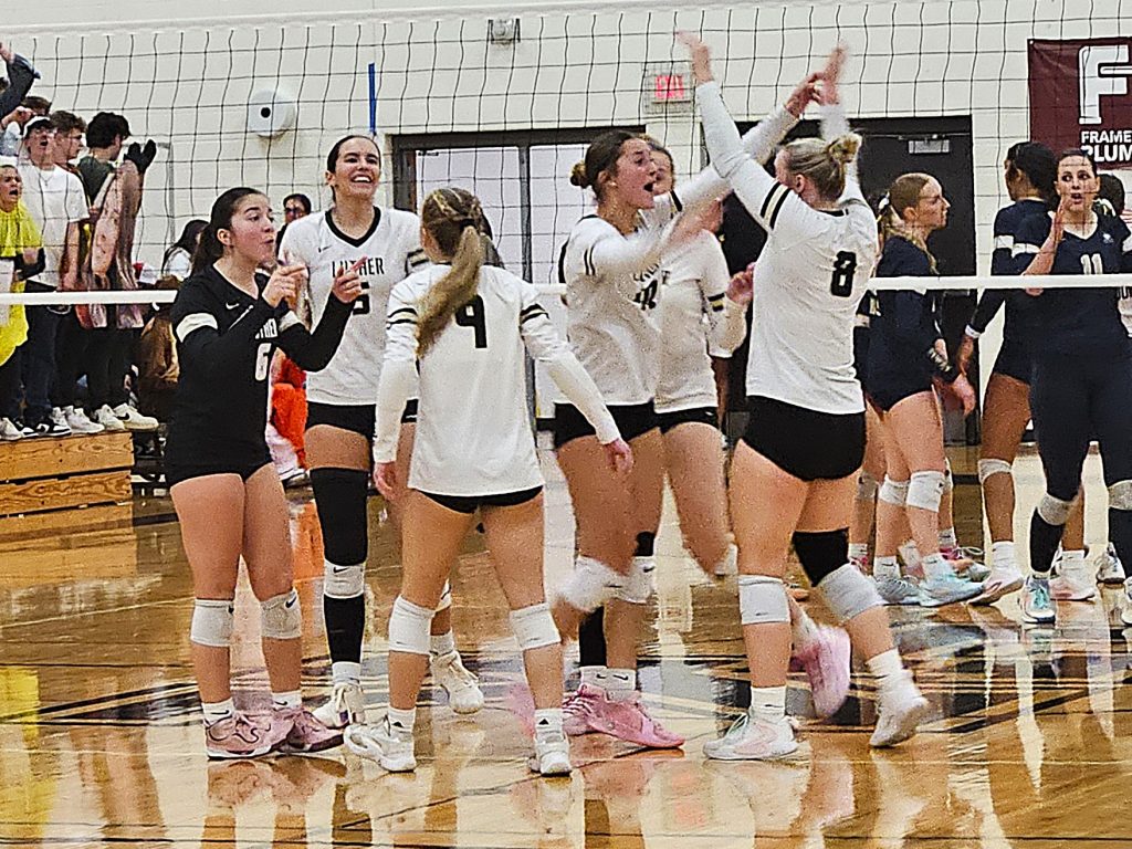The Onalaska Luther volleyball team beat Aquinas 16-14 in the fifth set of a WIAA Division 3 sectional semifinal on Thursday. -- TODD SOMMERFELDT PHOTO