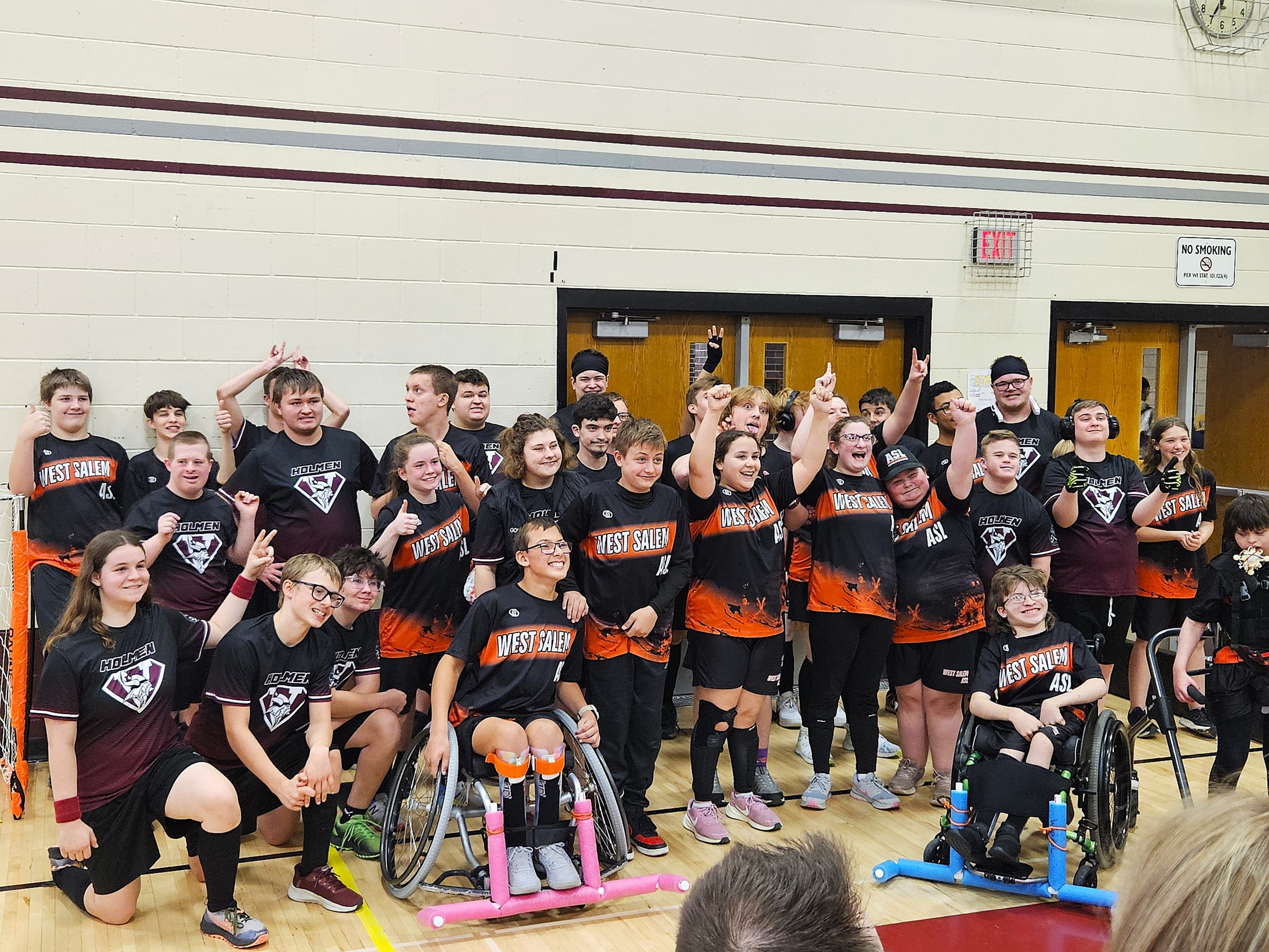 Members of the West Salem/Bangor and Holmen ASL soccer teams pose together after playing for the tournament championship at the Bernie L. Ferry Fieldhouse on Monday. -- TODD SOMMERFELDT PHOTO