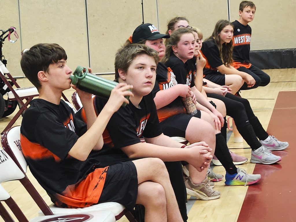 Members of the West Salem/Bangor ASL soccer team watch what's happening on the court during a tournament championship game at the Bernie L. Ferry Fieldhouse in Holmen. -- TODD SOMMERFELDT PHOTO