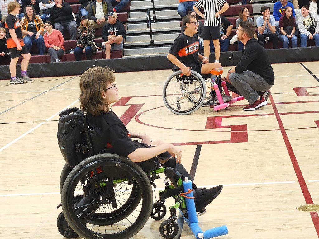 Holmen coach Nick Slusser talks to West Salem/Bangor's Bentlee Cleveland during a break in the action of Monday's ASL championship soccer game at the Bernie L. Ferry Fieldhouse in Holmen. -- TODD SOMMERFELDT PHOTO