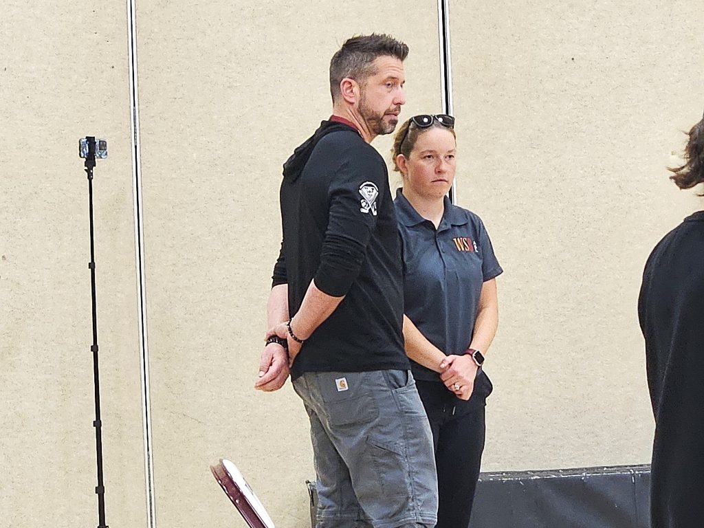 Holmen coach Nick Slusser and West Salem/Bangor coach Ashly Serres talk as their teams play for the ASL soccer championship at the Bernie L. Ferry Fieldhouse in Holmen. -- TODD SOMMERFELDT PHOTO