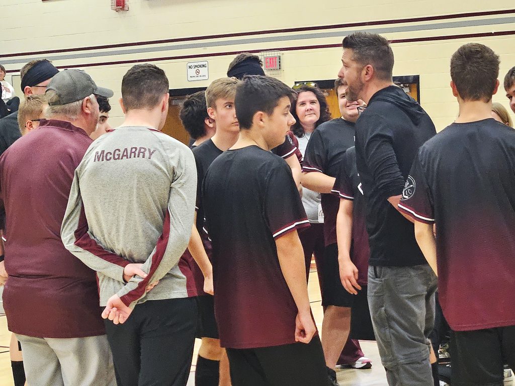 Holmen ASL soccer coach Nick Slusser talks to his team before action resumes in its tournament championship game against West Salem/Bangor at the Bernie L. Ferry Fieldhouse on Monday. -- TODD SOMMERFELDT PHOTO