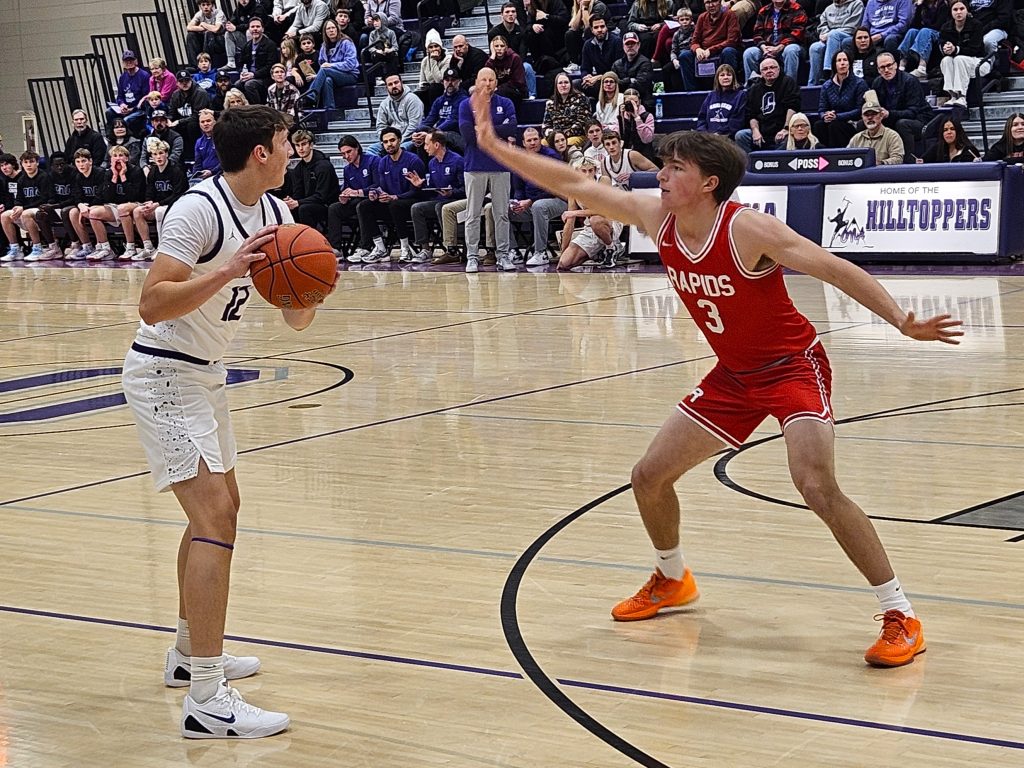 Onalaska senior Ian Kowal looks to pass on a night he scored 26 points in an 83-35 victory over Wisconsin Rapids. -- TODD SOMMERFELDT PHOTO