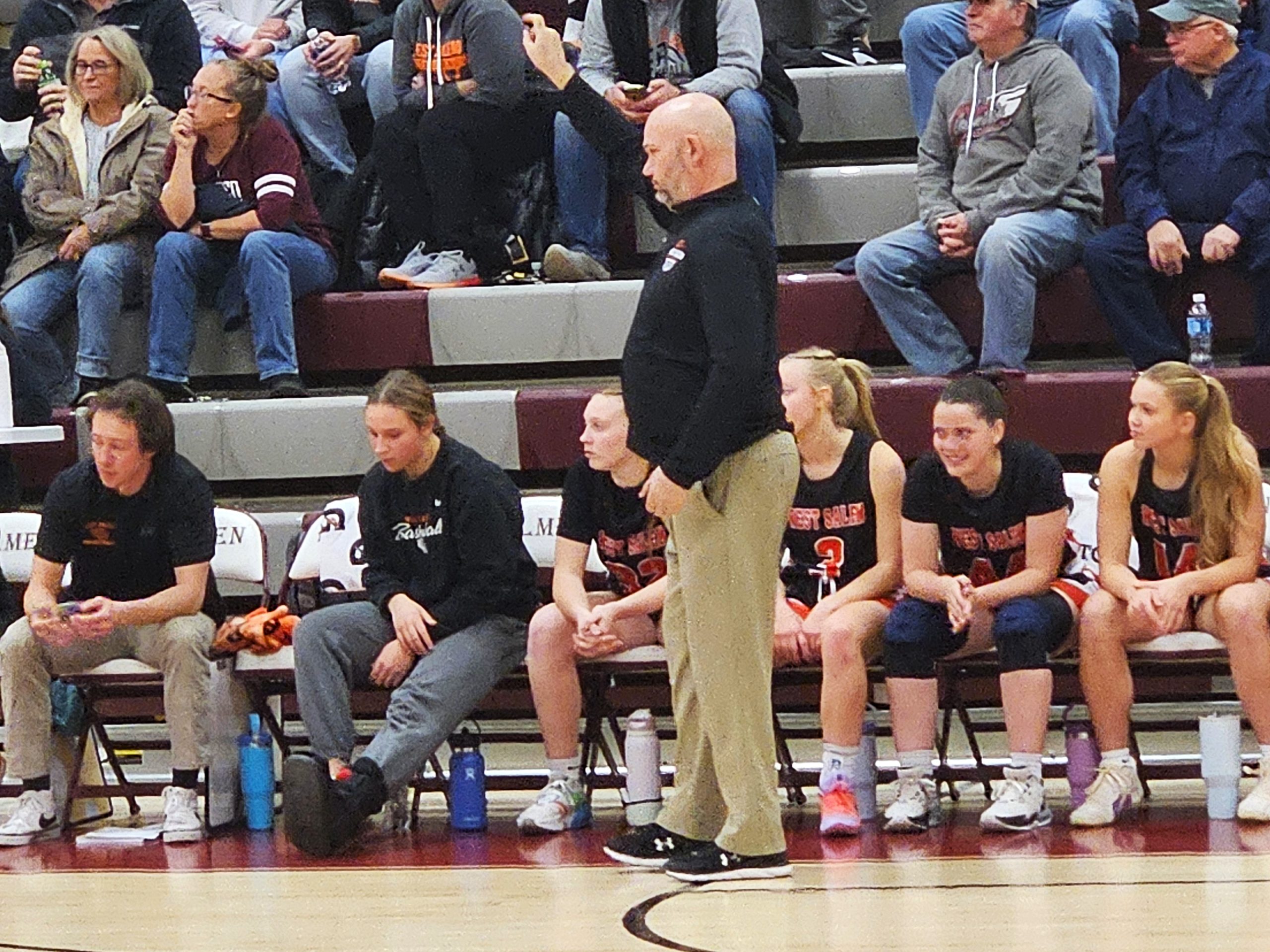 West Salem girls basketball coach Mike Malott signals to his team during a game against Holmen. -- TODD SOMMERFELDT PHOTO
