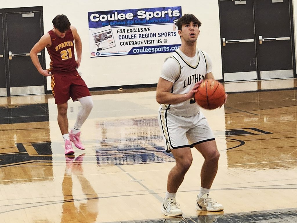 Onalaska Luther's Logan Pierce concentrates on a free throw during Friday's nonconference game against visiting Sparta. -- TODD SOMMERFELDT PHOTO