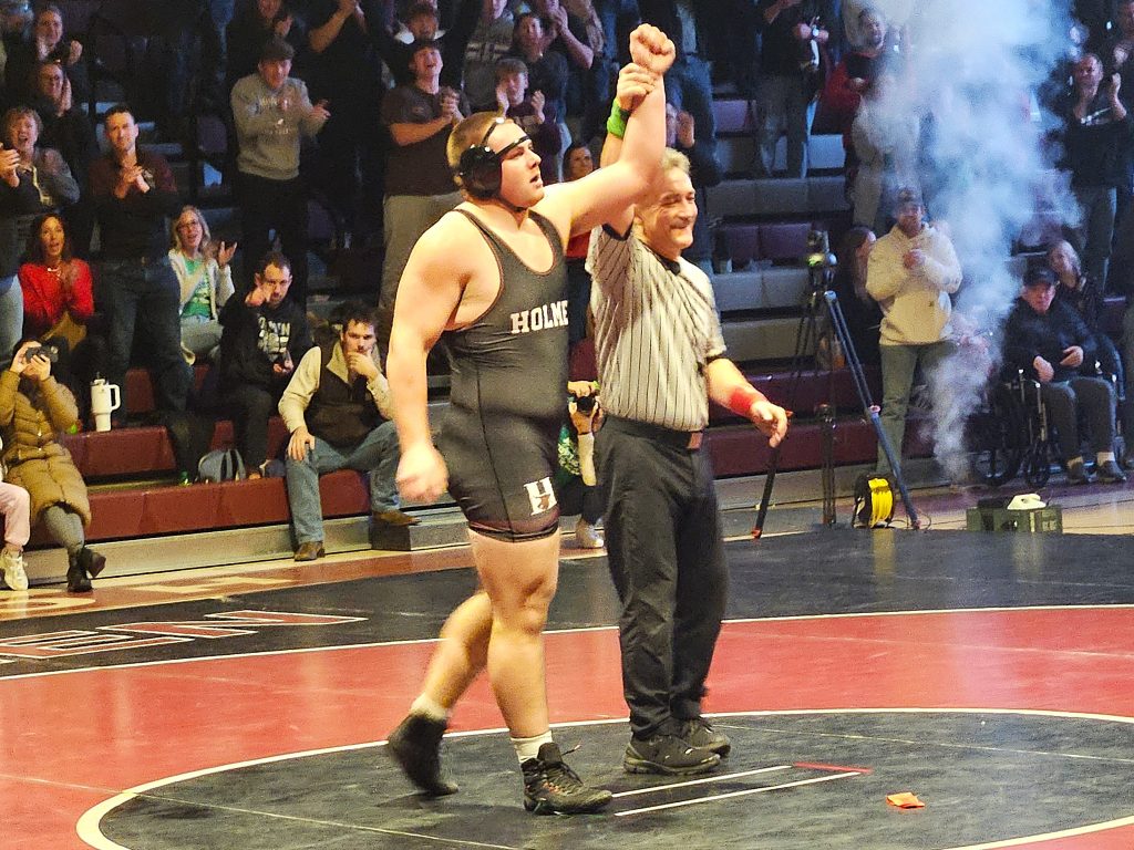 Holmen senior Jagger Jepson has his hand raised after a victory at 285 pounds that gave the Vikings a 36-34 dual win over Waverly-Shell Rock (Iowa) on Thursday. -- TODD SOMMERFELDT PHOTO