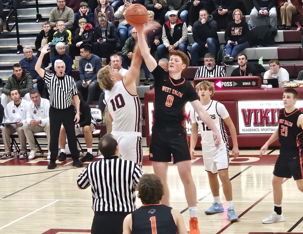 West Salem's Tyson Labus and Holmen's Colin Williams go after the tip during Monday's nonconference basketball game in Holmen. -- TODD SOMMERFELDT PHOTO
