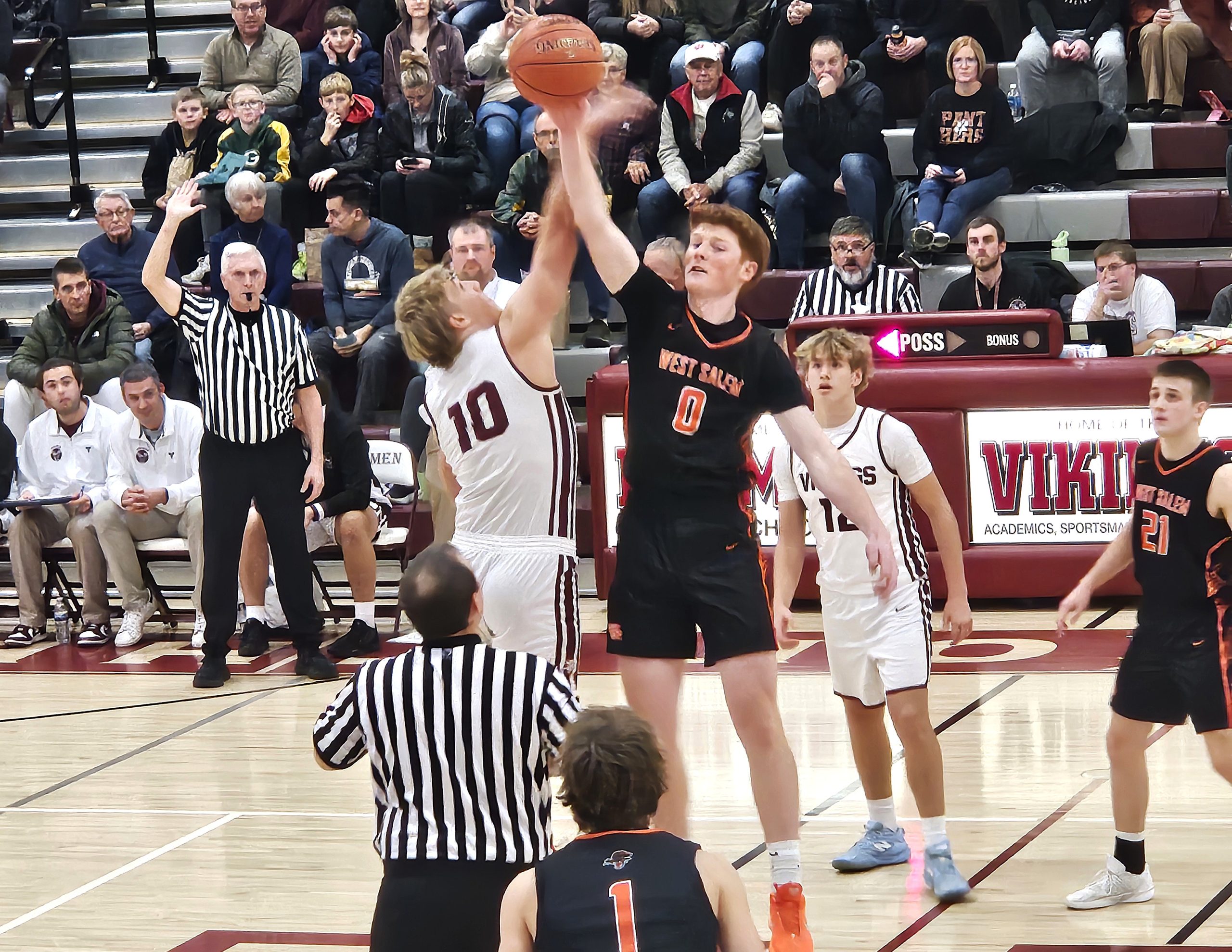 West Salem's Tyson Labus and Holmen's Colin Williams go after the tip during Monday's nonconference basketball game in Holmen. -- TODD SOMMERFELDT PHOTO