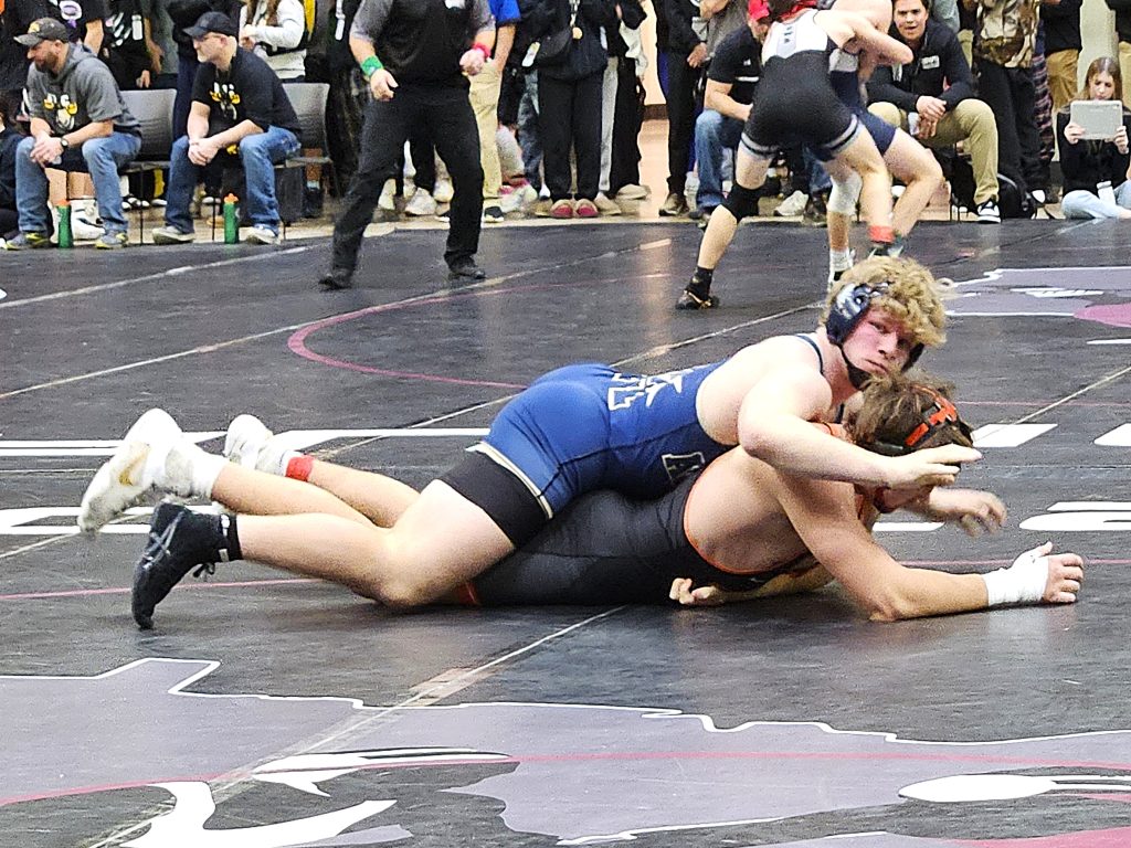 Aquinas senior Tyson Martin controls is 285-pound quarterfinal match at the Bi-State Classic. -- TODD SOMMERFELDT PHOTO
