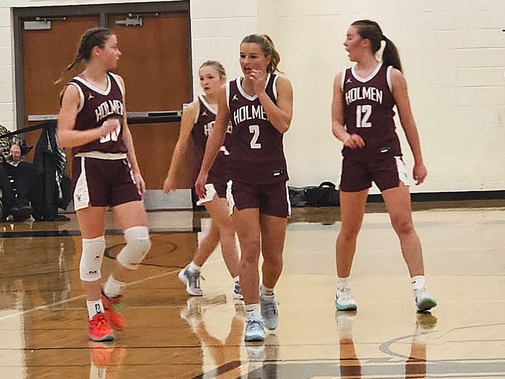 The Holmen girls basketball lineup walks back to the court during Friday's nonconference win at Onalaska Luther. -- TODD SOMMERFELDT PHOTO