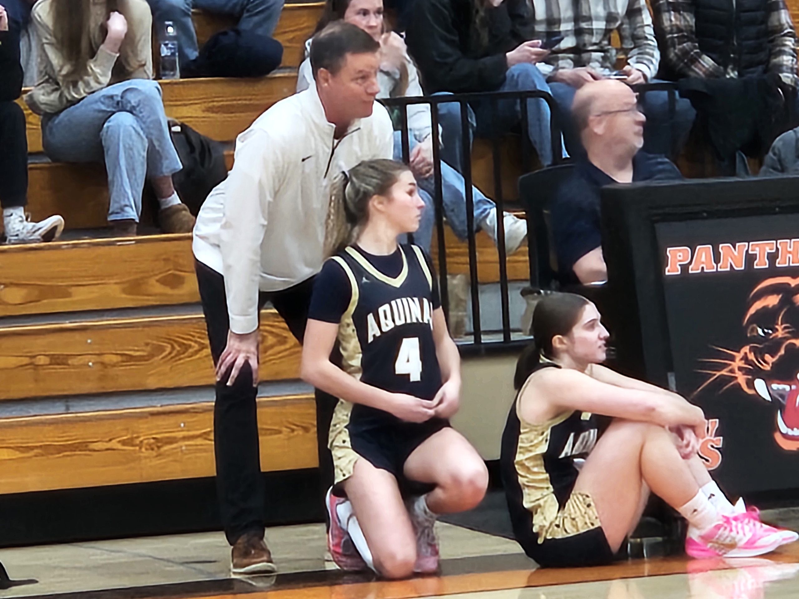Aquinas girls basketball coach Dave Donarski waits for a substitution during Saturday's nonconference game at West Salem. -- TODD SOMMERFELDT PHOTO