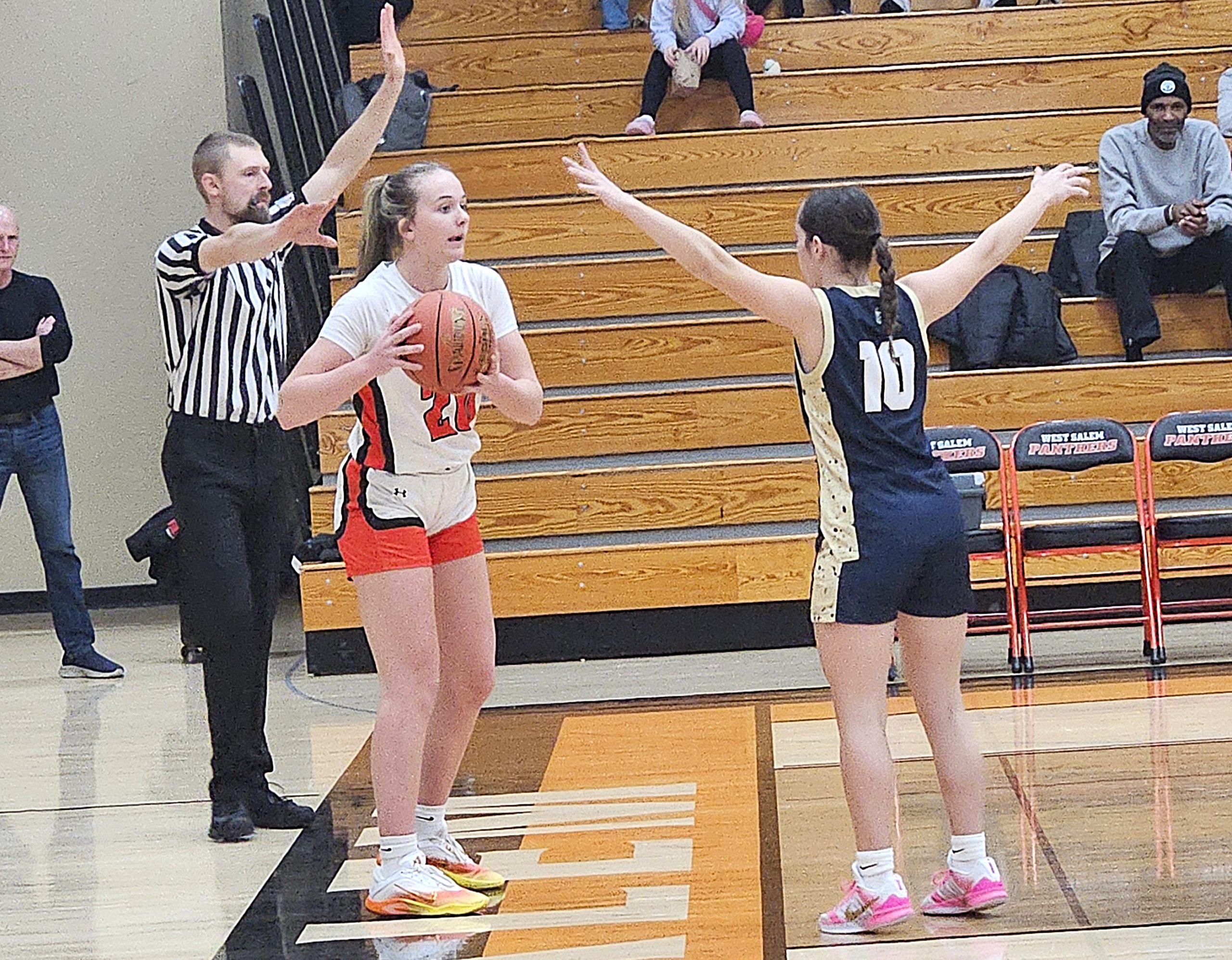 West Salem senior Josie Brudos tries to inbound the basketball during a game against Aquinas on Saturday. -- TODD SOMMERFELDT PHOTO