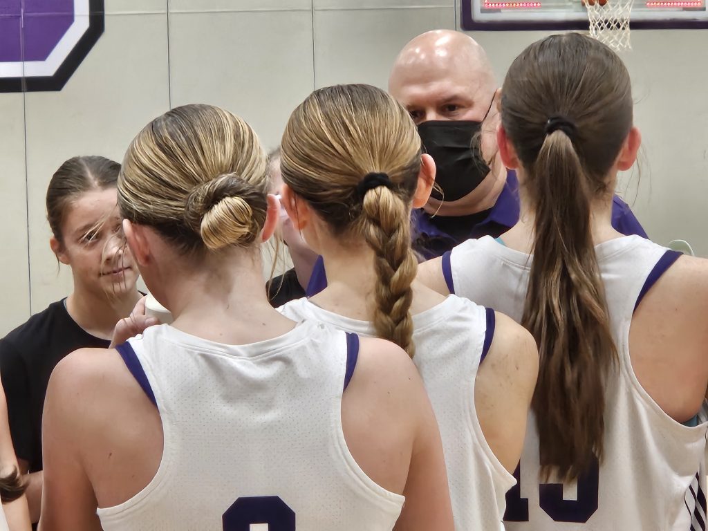 Onalaska girls basketball coach Tom Cowley talks to his players after a win over Holmen on Friday. -- TODD SOMMERFELDT PHOTO