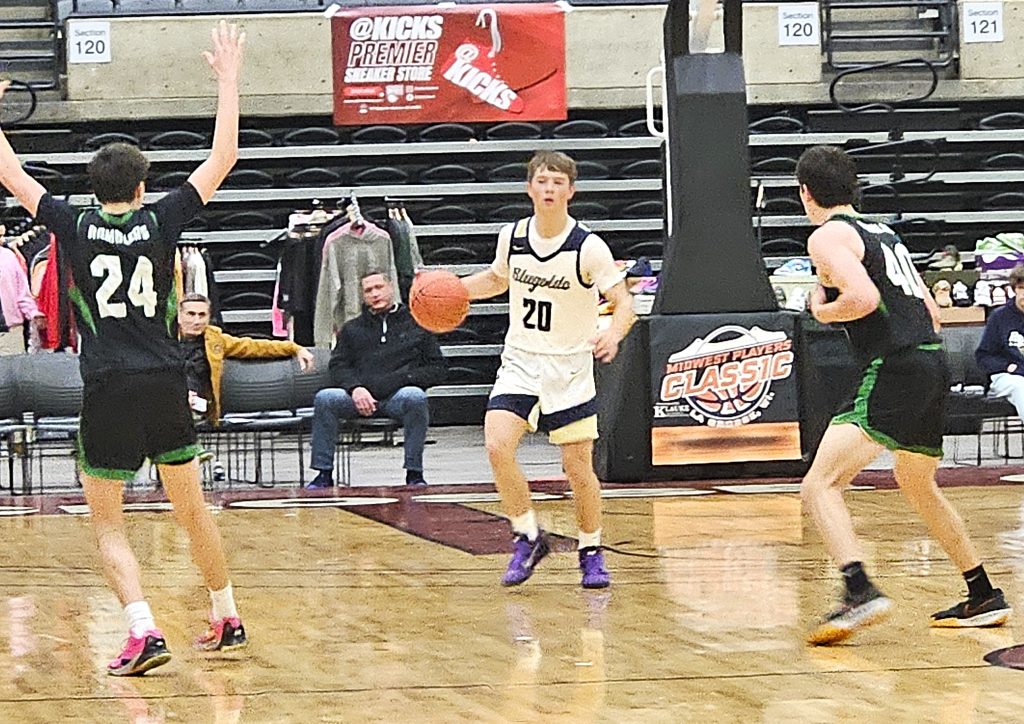 Aquinas senior Ryan Johnson looks to get the Blugolds into their offense against Eau Claire Regis on Friday. -- TODD SOMMERFELDT PHOTO