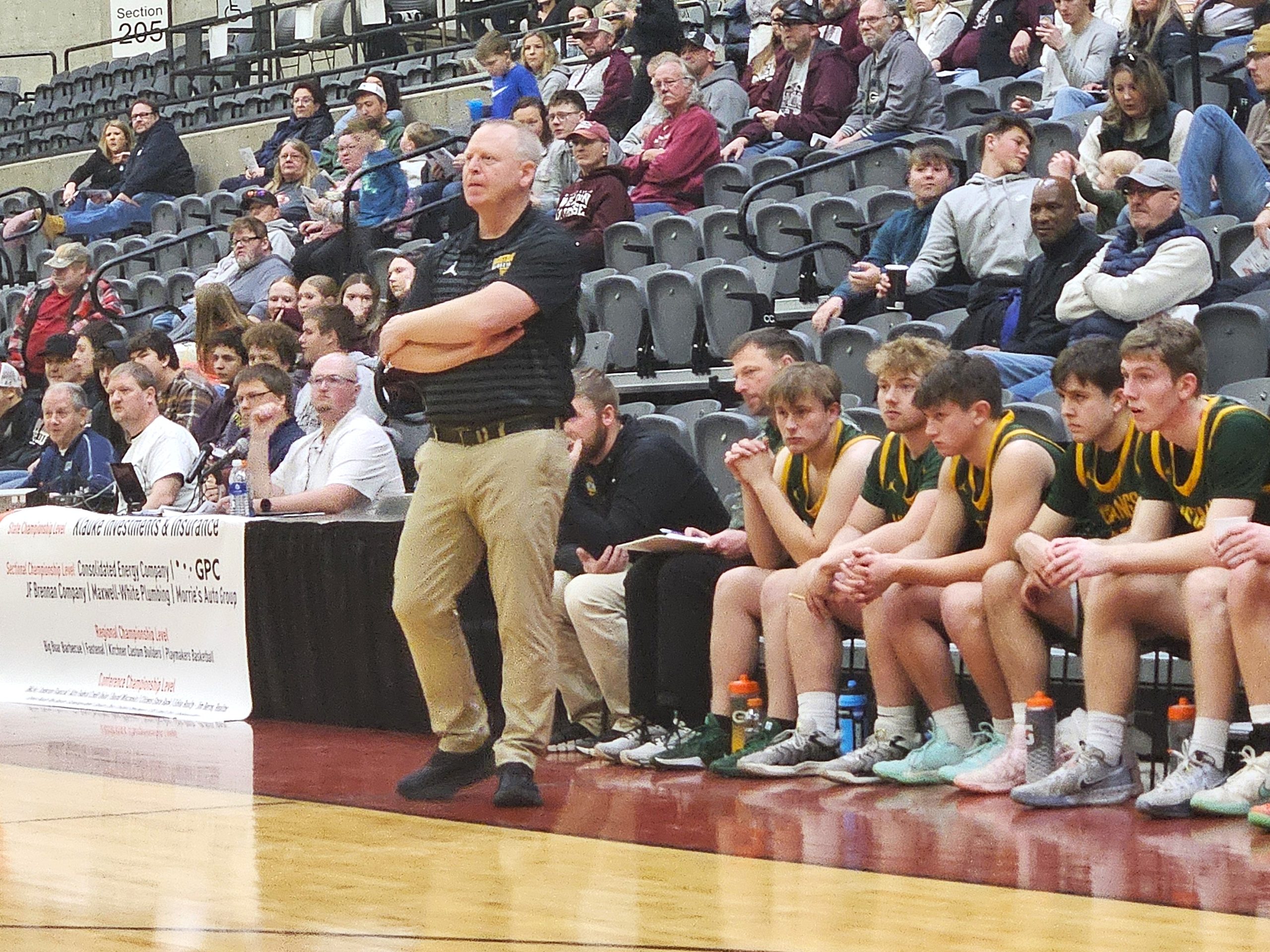 Melrose-Mindoro boys basketball coach Dave Cowley watches his team play North Crawford at the La Crosse Center. -- TODD SOMMERFELDT PHOTO