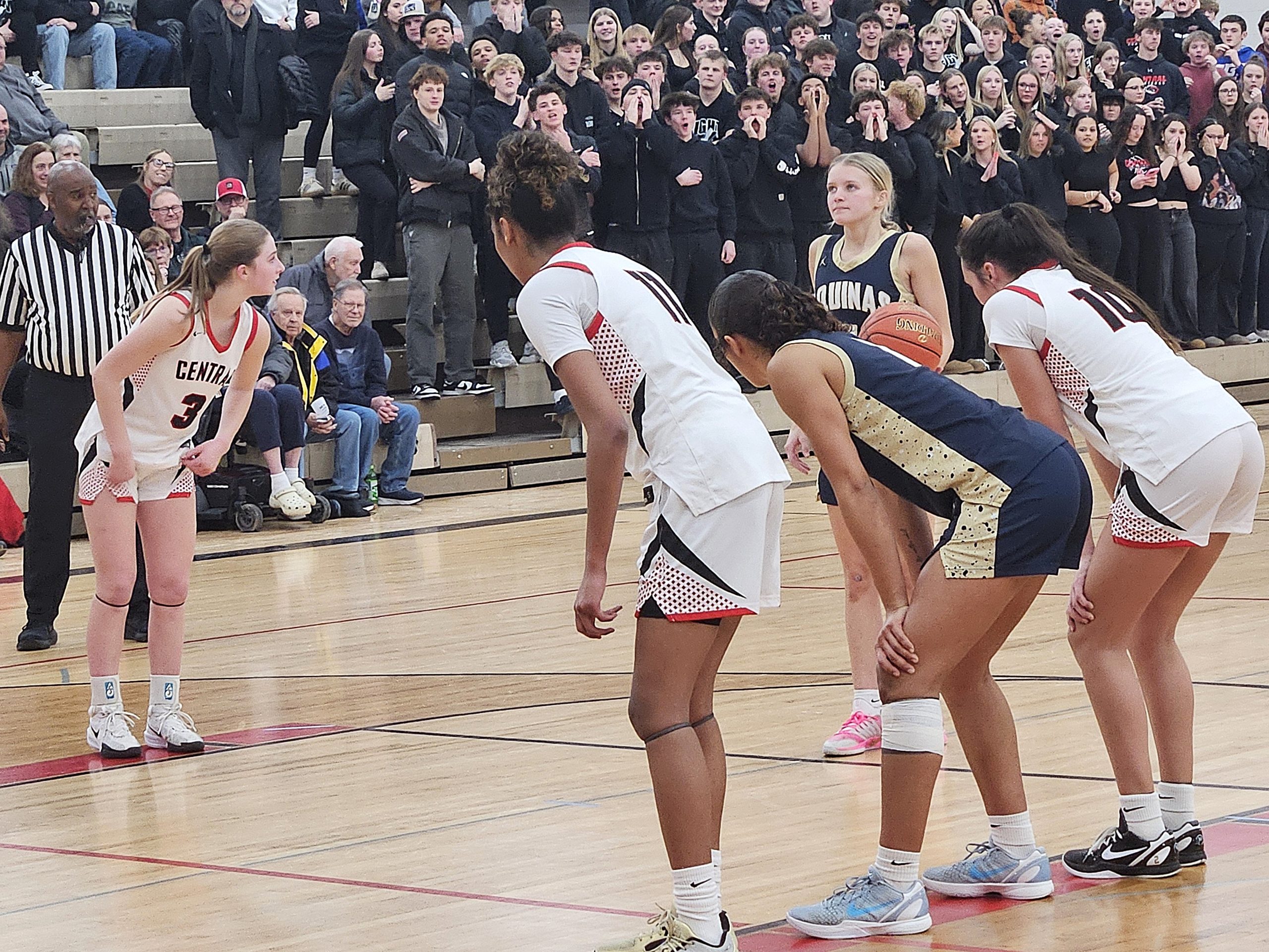 Aquinas junior Ava Fernholz prepares to shoot one of the nine free throws she made during an 18-point game in a win over Central on Tuesday. -- TODD SOMMERFELDT PHOTO