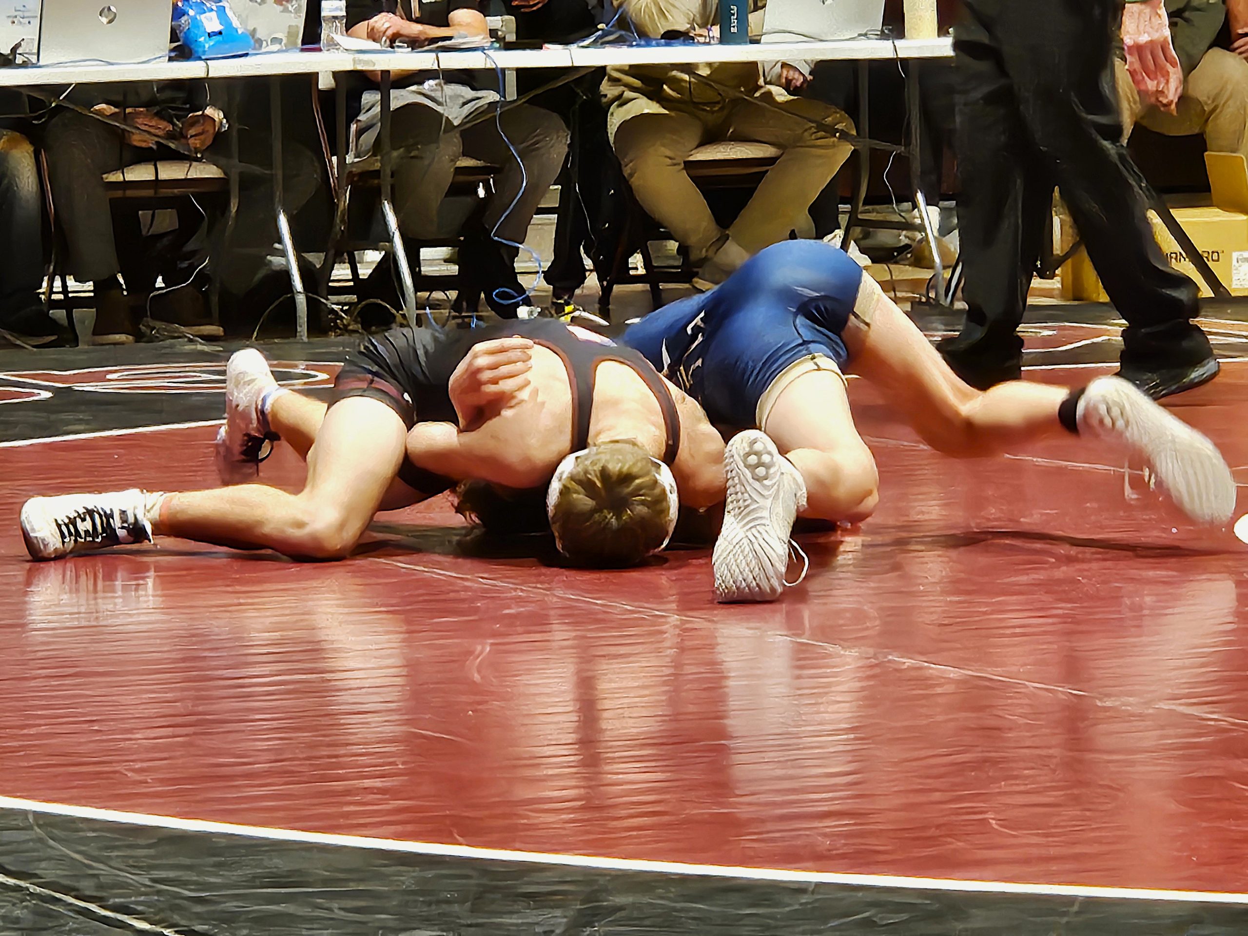 Holmen sophomore Rex Lancaster tries to end his `20-pound match against Aquinas freshman Mason Klar during Thursday's MVC dual meet at Holmen. -- TODD SOMMERFELDT PHOTO