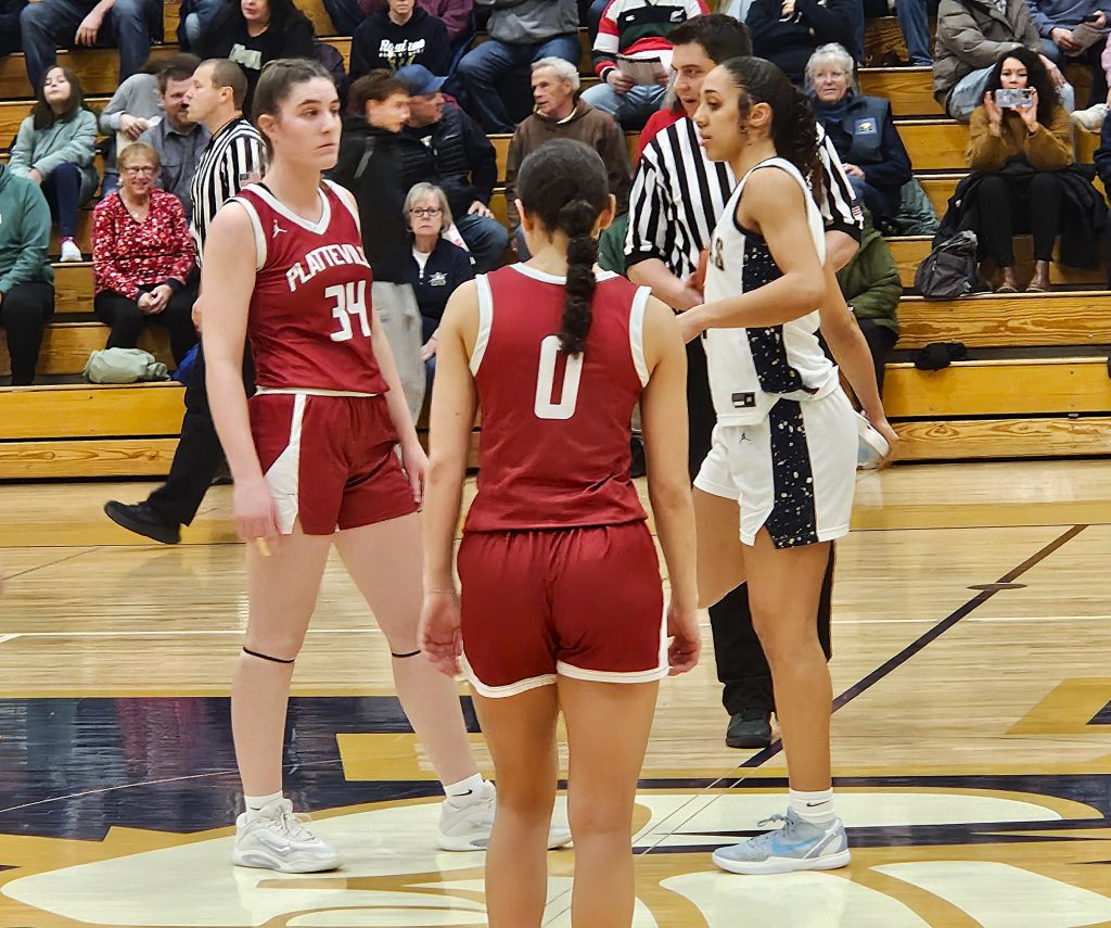 Aquinas senior Sammy Davis waits for the jump ball in Tuesday's nonconference game against Platteville. -- TODD SOMMERFELDT PHOTO