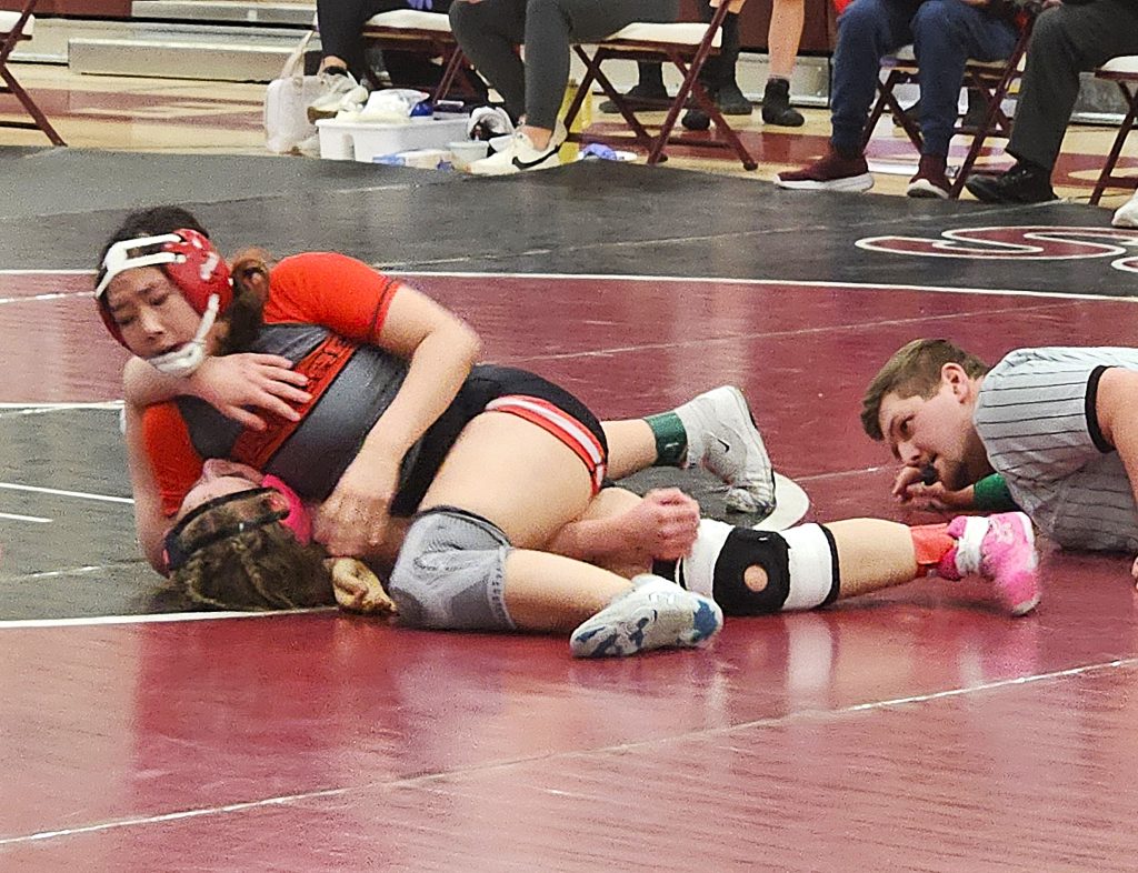 Logan/Central junior Rachael Hang has the advantage on Holmen's Ruby Gustafson in the 138-pound championship match at a WIAA regional meet in Holmen. -- TODD SOMMERFELDT PHOTO