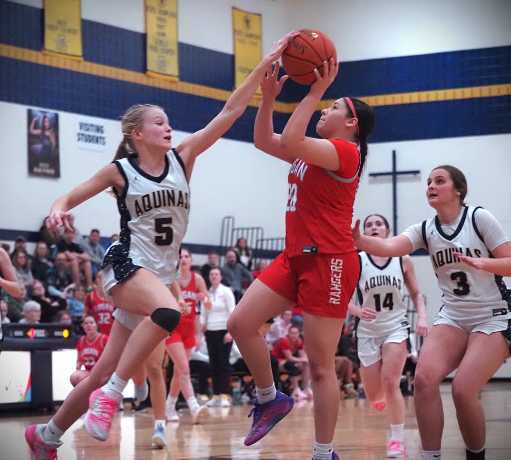 Logan vs. Aquinas girls basketball. -- TARA WALTERS PHOTO