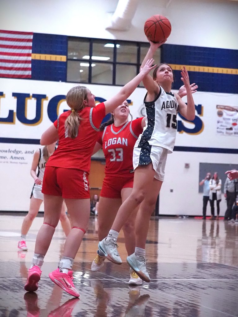 Logan vs. Aquinas girls basketball. -- TARA WALTERS PHOTO