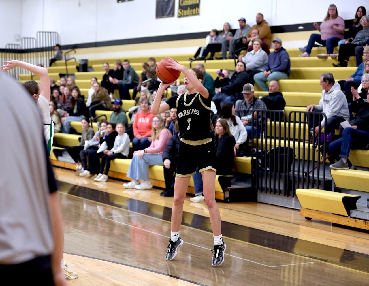 Caledonia senior Aubrie Klug releases the shot that moved her to 2,000 career points on Thursday. -- CRAIG JOHNSON PHOTO