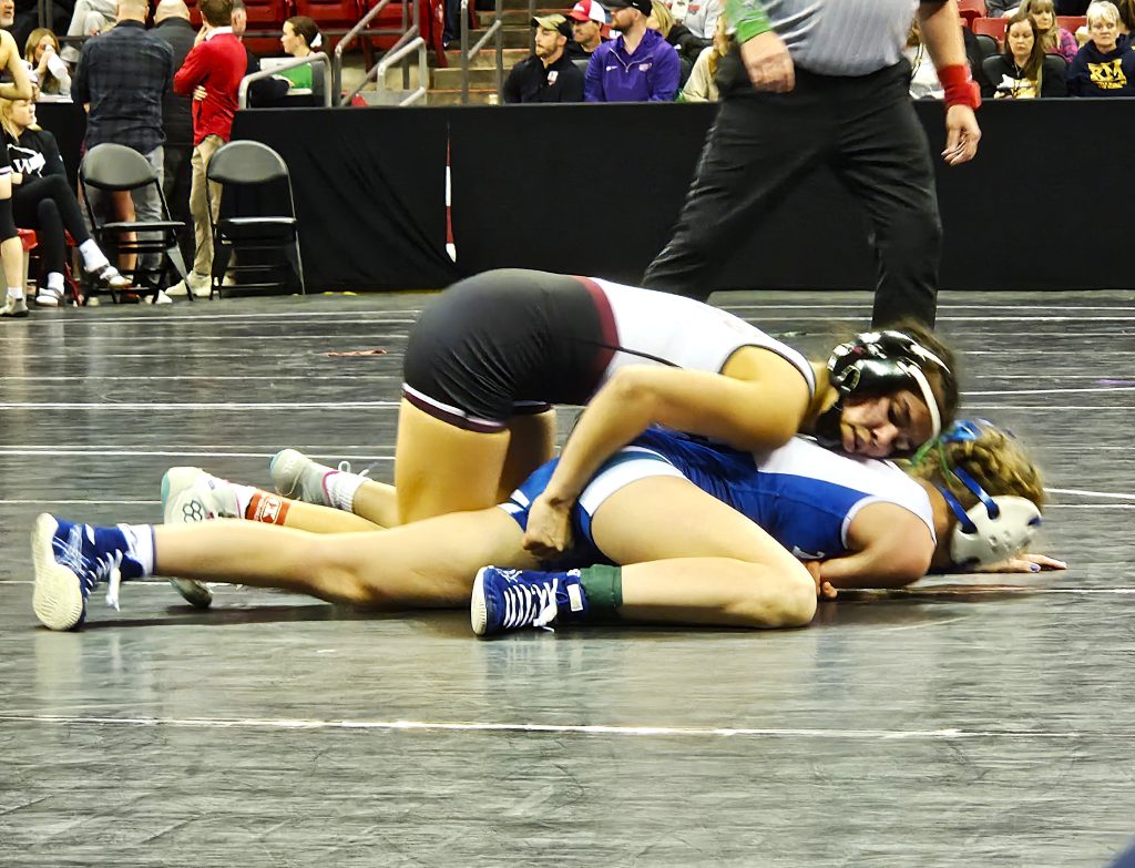 Holmen junior Aini Anderson controls the action during her 100-pound quarterfinal match at the WIAA individual state tournament in Madison. -- TODD SOMMERFELDT PHOTO