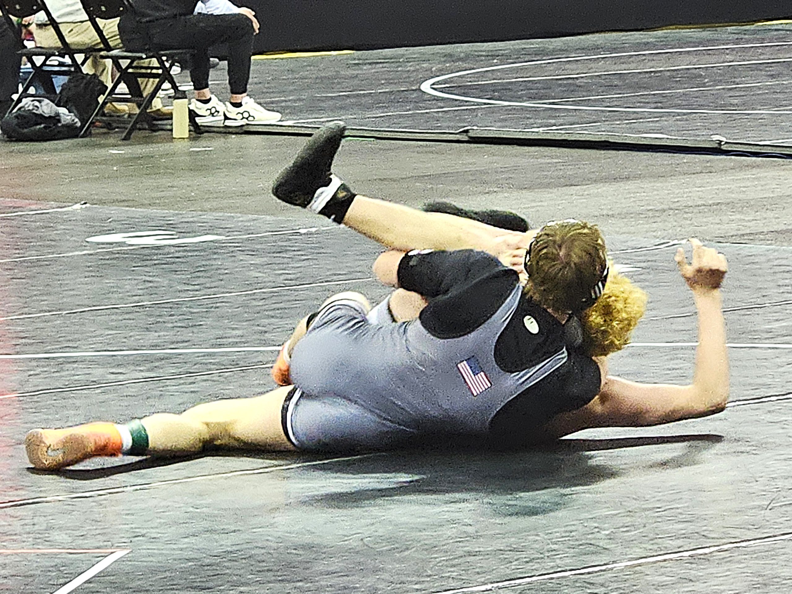 West Salem/Bangor senior Mason Chambers goes for the pin during his Division 2 157-pound quarterfinal match at the WIAA individual state tournament. -- TODD SOMMERFELDT PHOTO