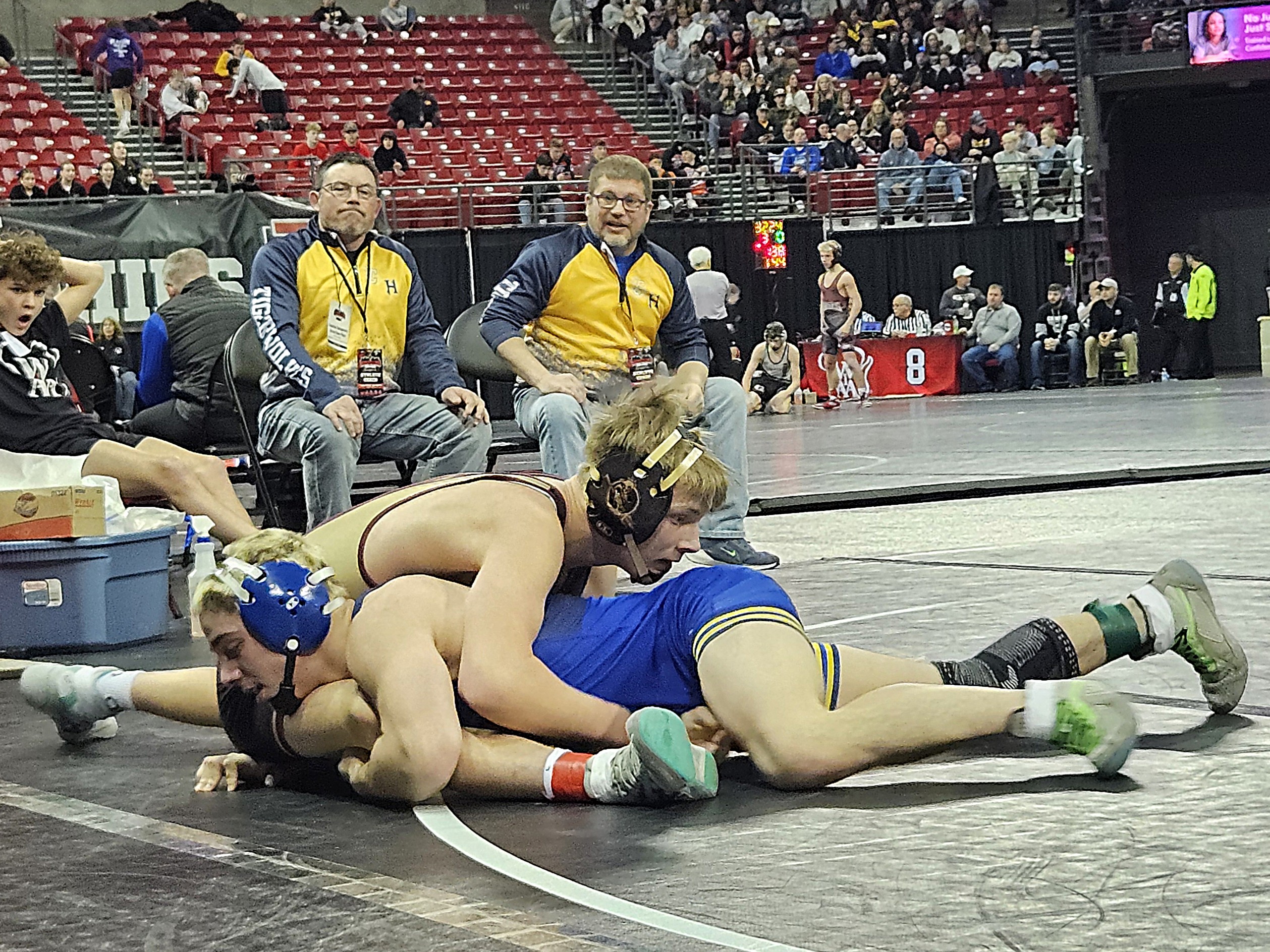 G-E-T/Melrose-Mindoro junior Brody Banse fights off a takedown during a Division 2 144-pound consolation match at the Kohl Center on Saturday. -- TODD SOMMERFELDT PHOTO