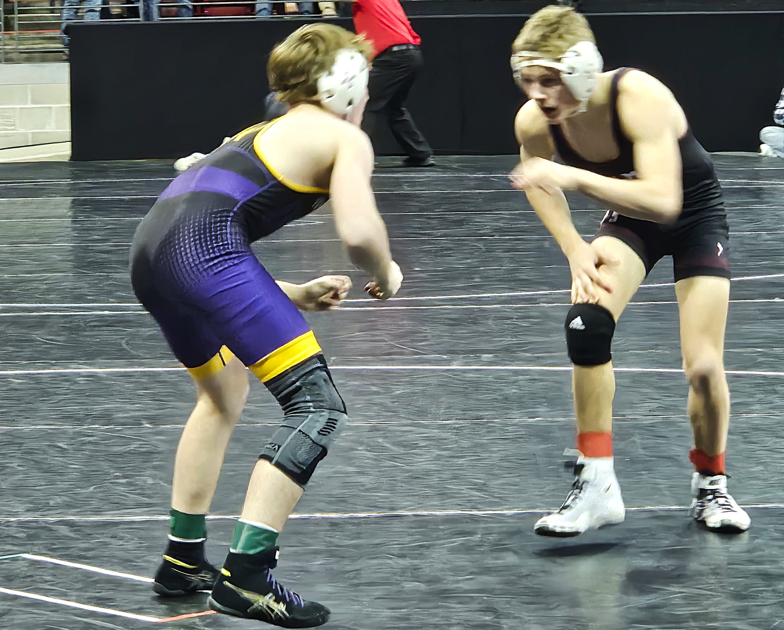 Holmen sophomore Rex Lancaster is in the WIAA Division 1 state finals at 120 pounds after winning this semifinal match in the closing seconds. -- TODD SOMMERFELDT PHOTO