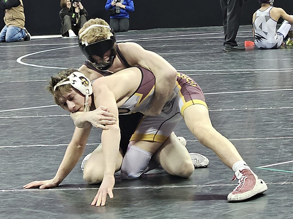 Holmen sophomore Nathan Henderson wrestles for third place at the Kohl Center in Madison. -- TODD SOMMERFELDT PHOTO